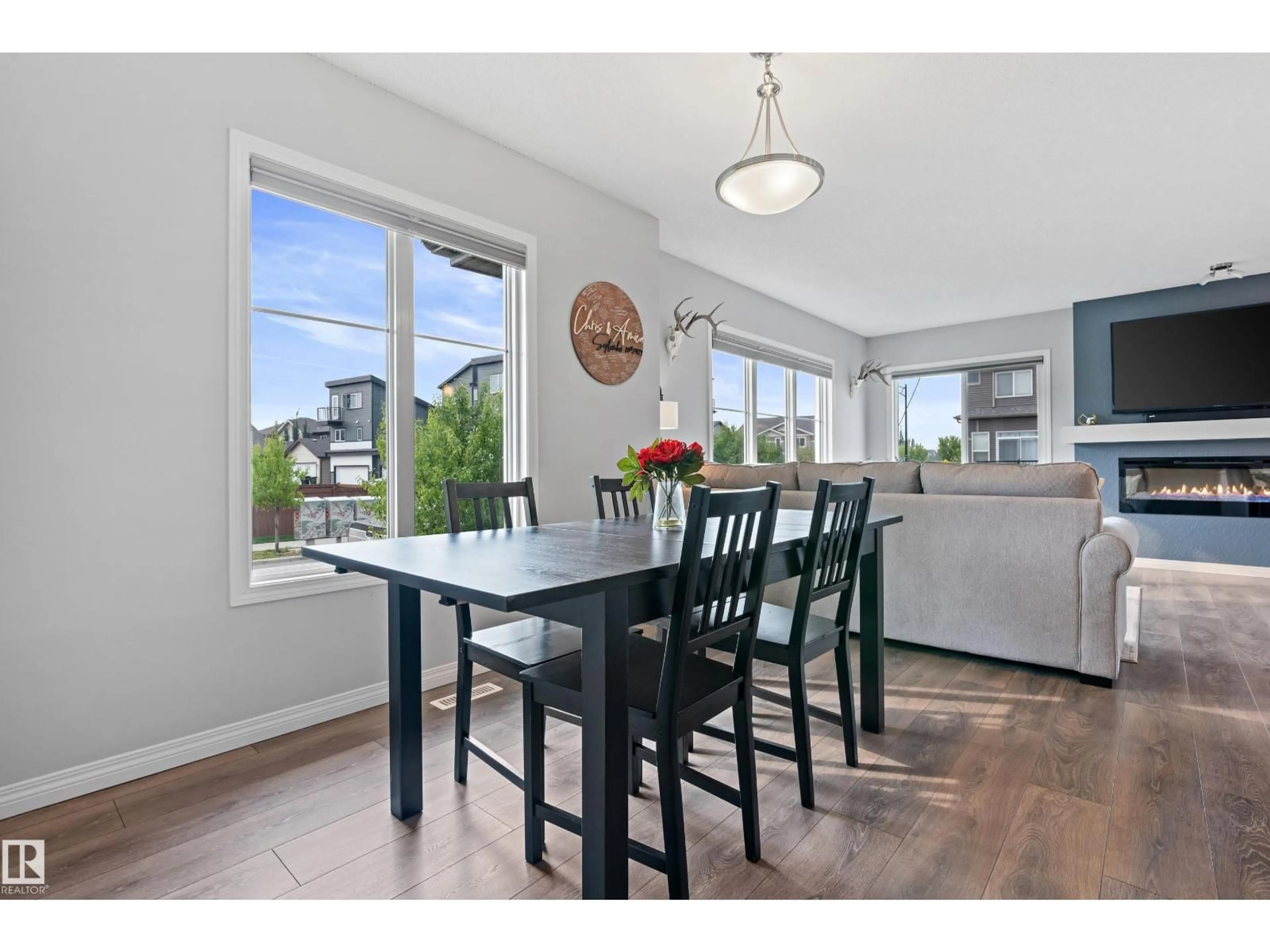 Dining room, wood/laminate floor for SW - 2004 PRICE LD, Edmonton Alberta T6W3P9