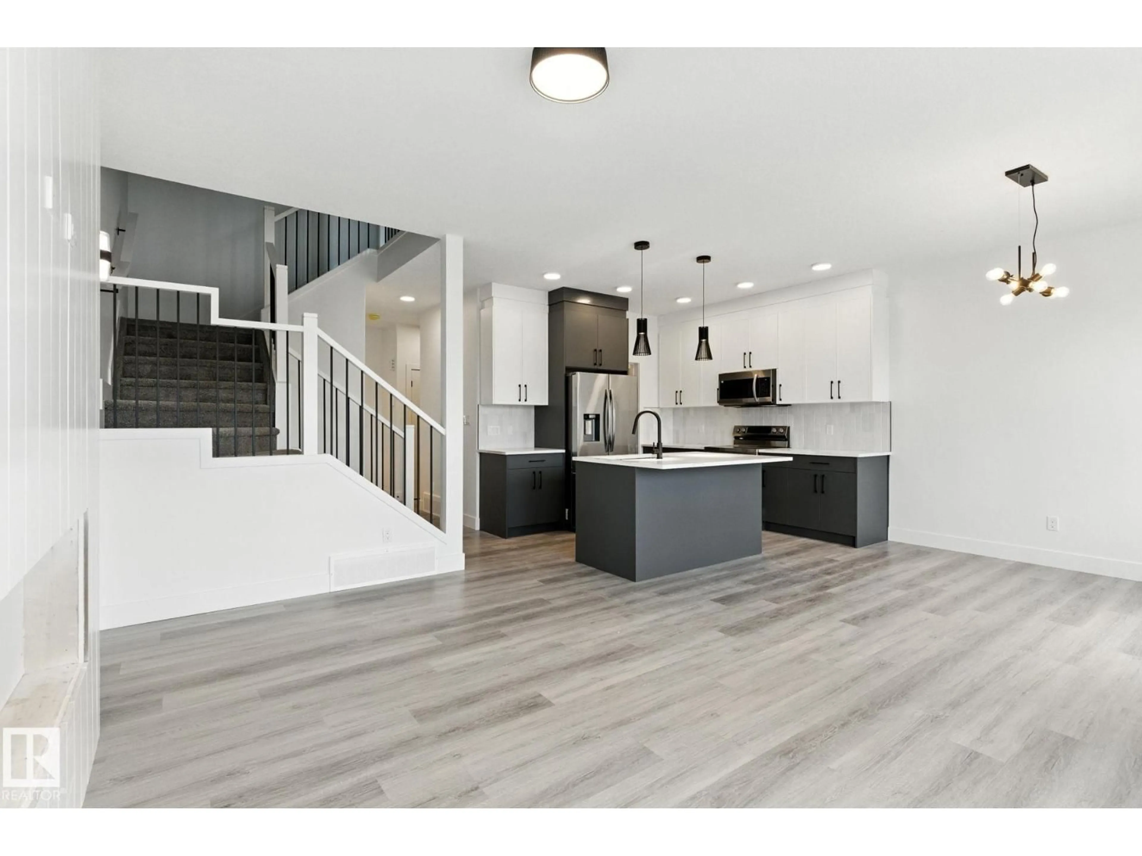 Open concept kitchen, unknown for 8827 181 AV, Edmonton Alberta T5Z0X4