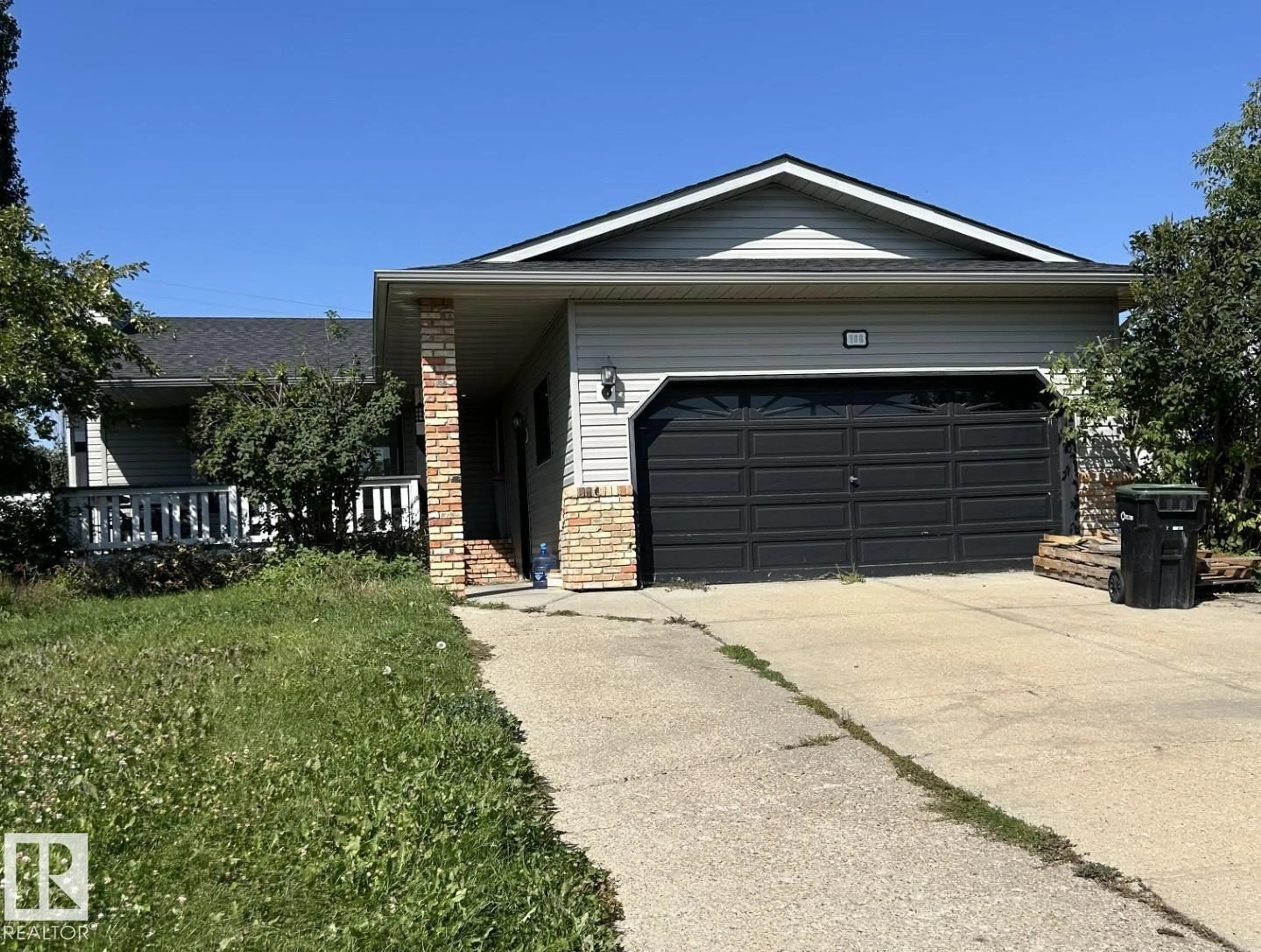 Home with vinyl exterior material, street for 166 WEST LIBERTY CR, Millet Alberta T0C1Z0
