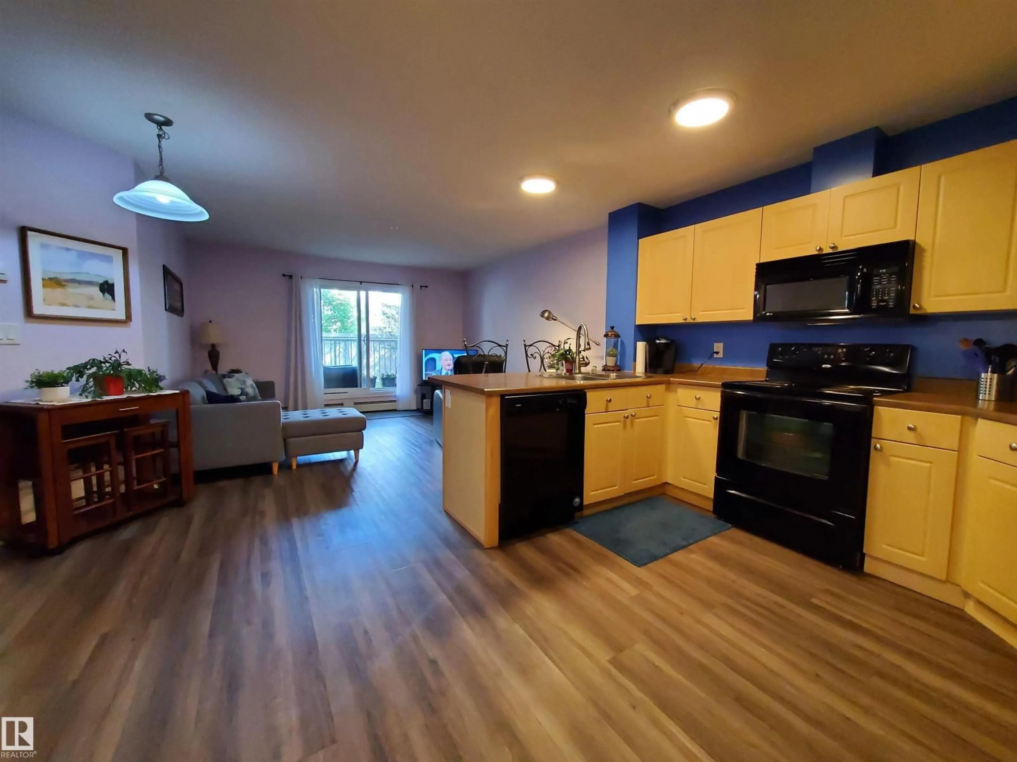 Open concept kitchen, unknown for #109 - 4403 23 ST, Edmonton Alberta T6T1E4
