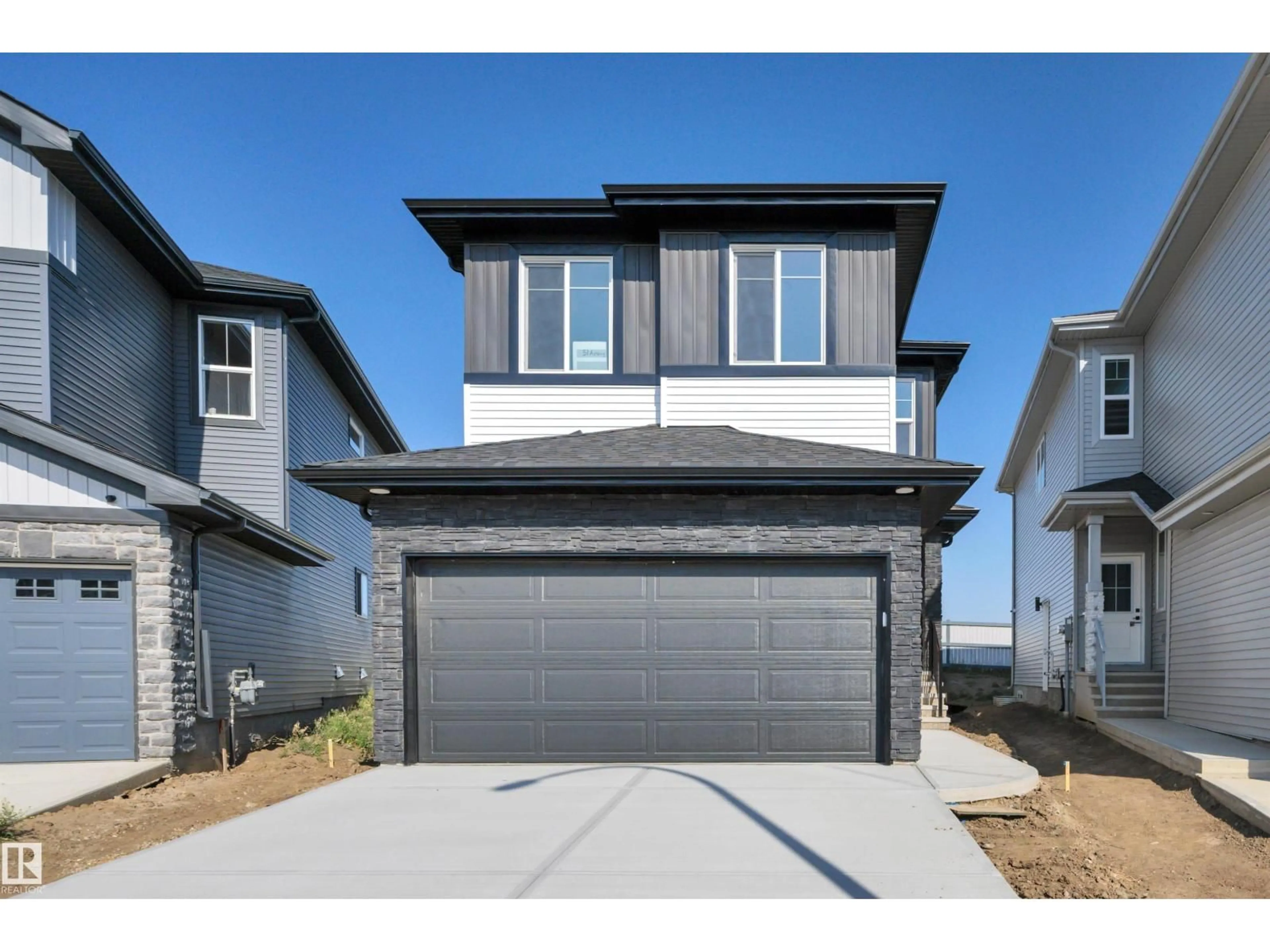 Home with vinyl exterior material, street for 51 ASHBURY CR, Spruce Grove Alberta T7X3C6