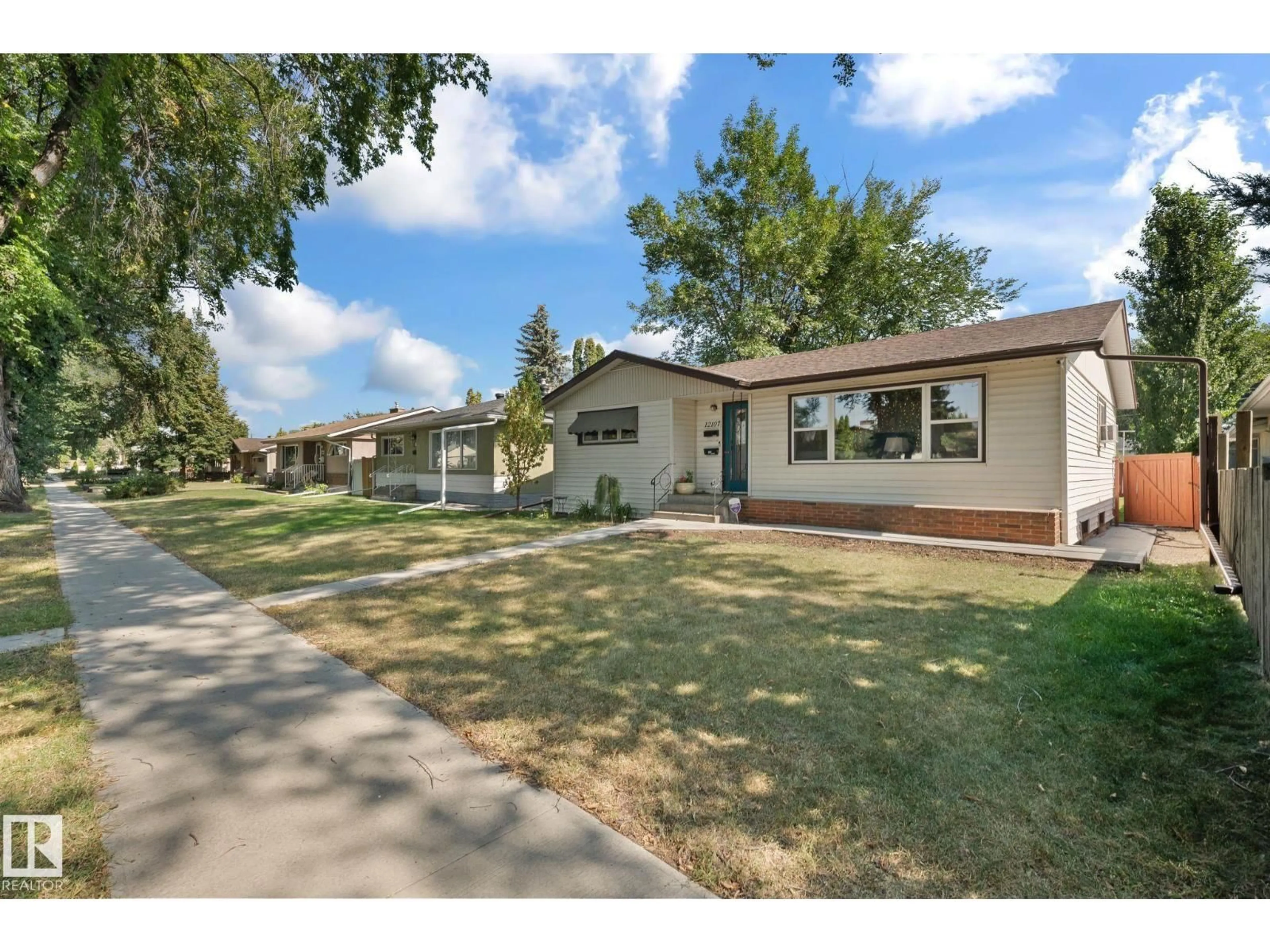 A pic from outside/outdoor area/front of a property/back of a property/a pic from drone, street for NW - 12107 53 ST, Edmonton Alberta T5W3L8