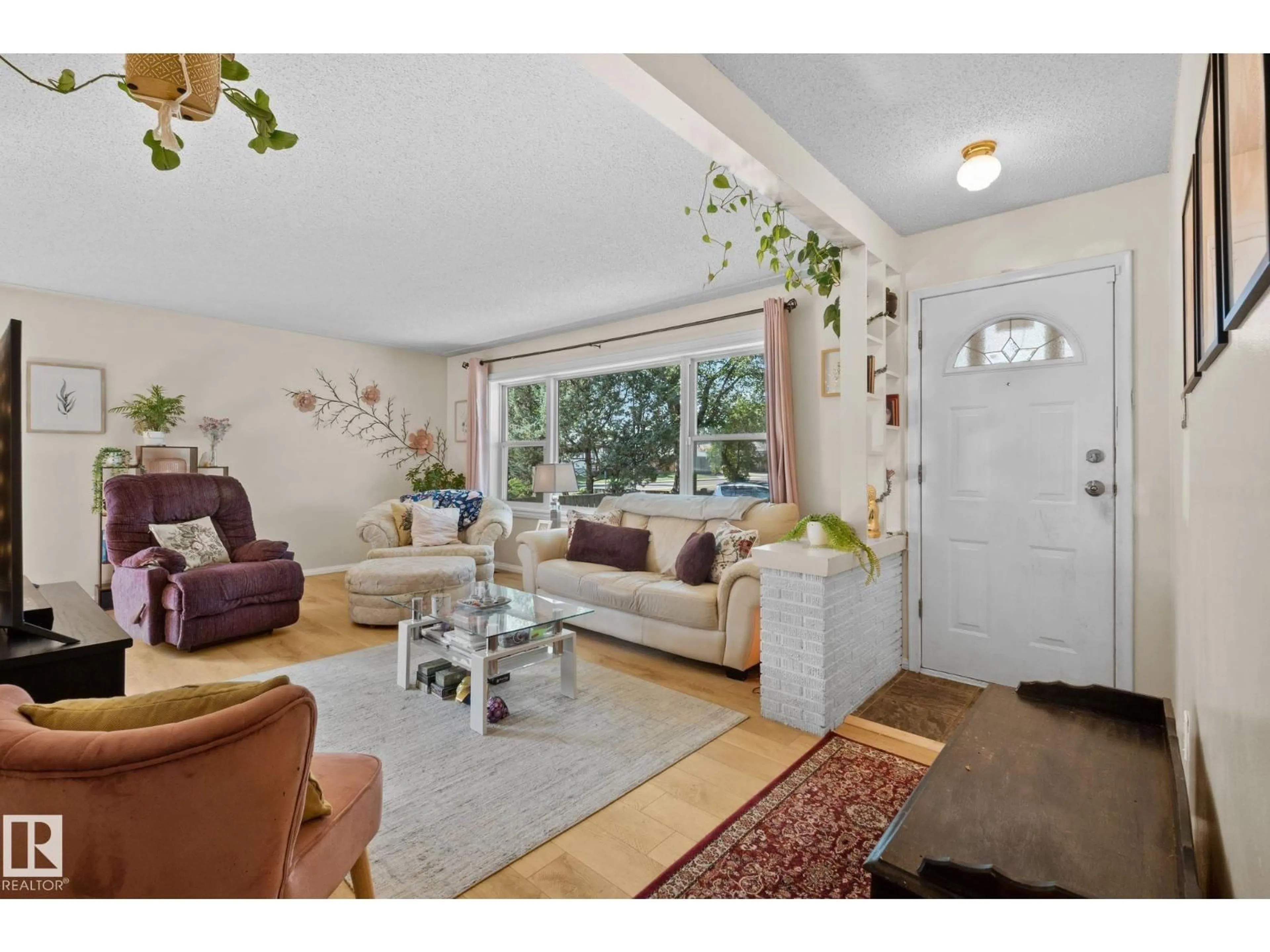 Living room with furniture, unknown for NW - 12107 53 ST, Edmonton Alberta T5W3L8
