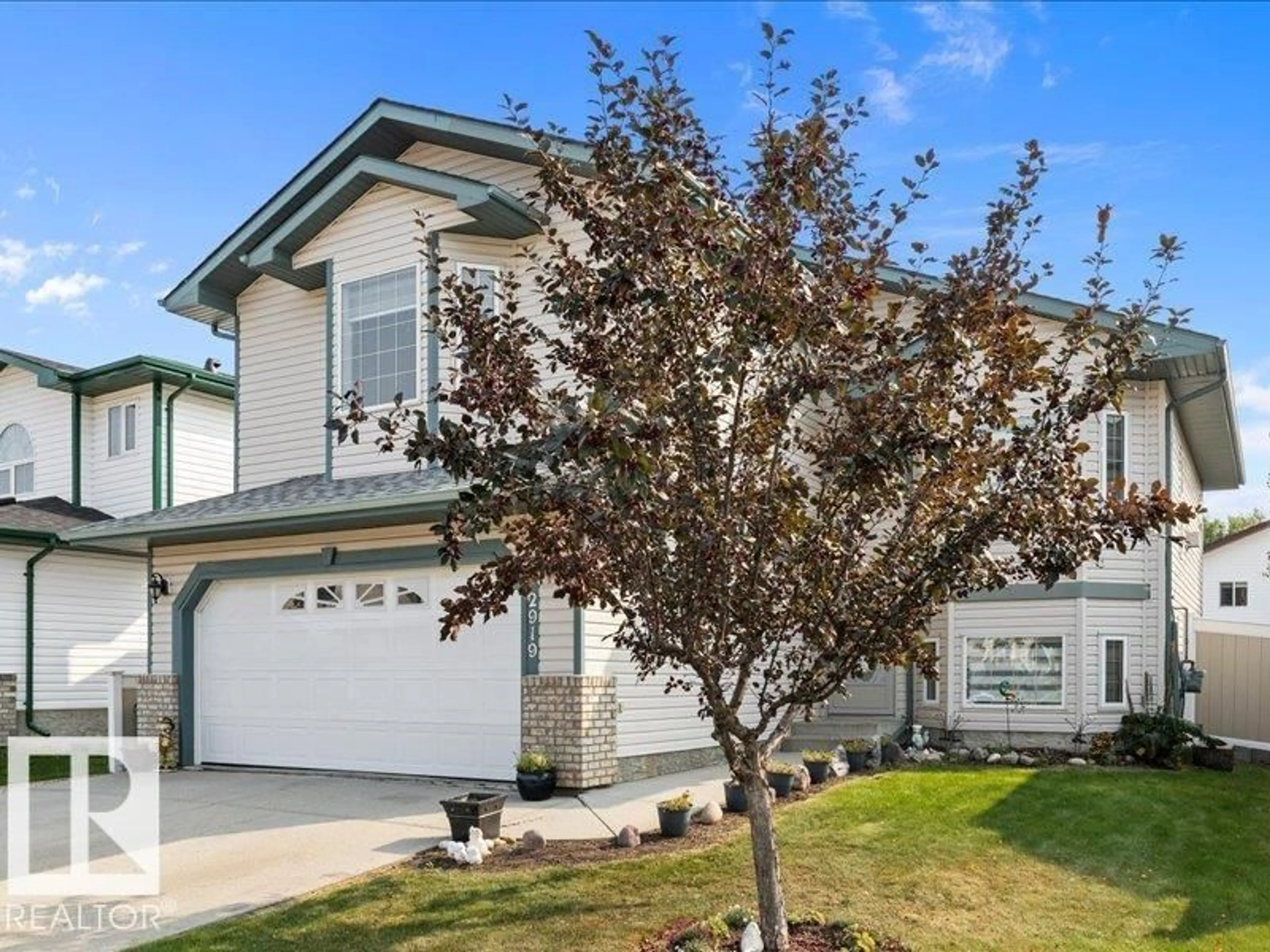 Home with vinyl exterior material, street for 2919 151A AV, Edmonton Alberta T5Y2Y5