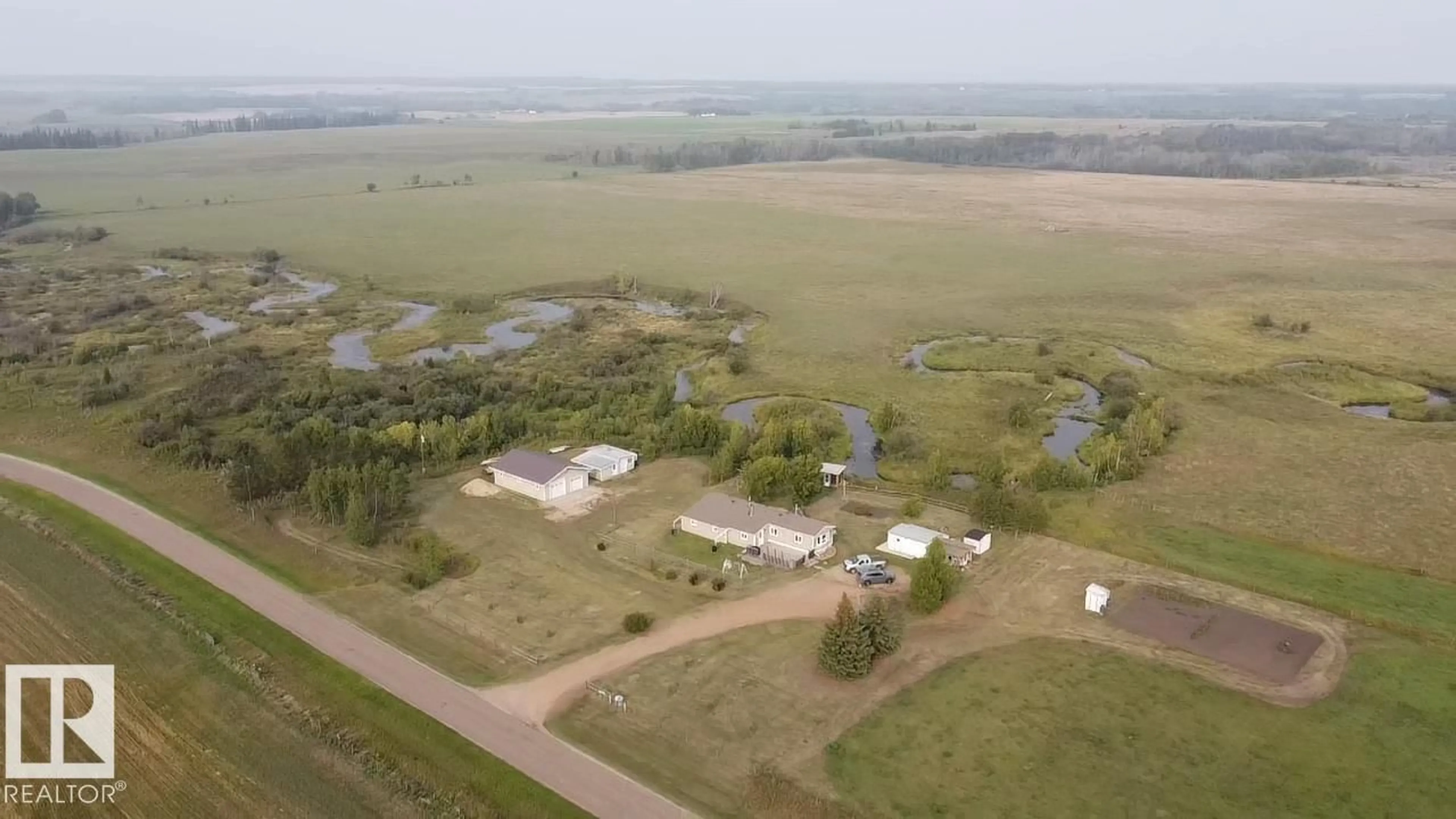 A pic from outside/outdoor area/front of a property/back of a property/a pic from drone, unknown for 59413 RANGE 163 RD, Rural Smoky Lake County Alberta T0A3C0