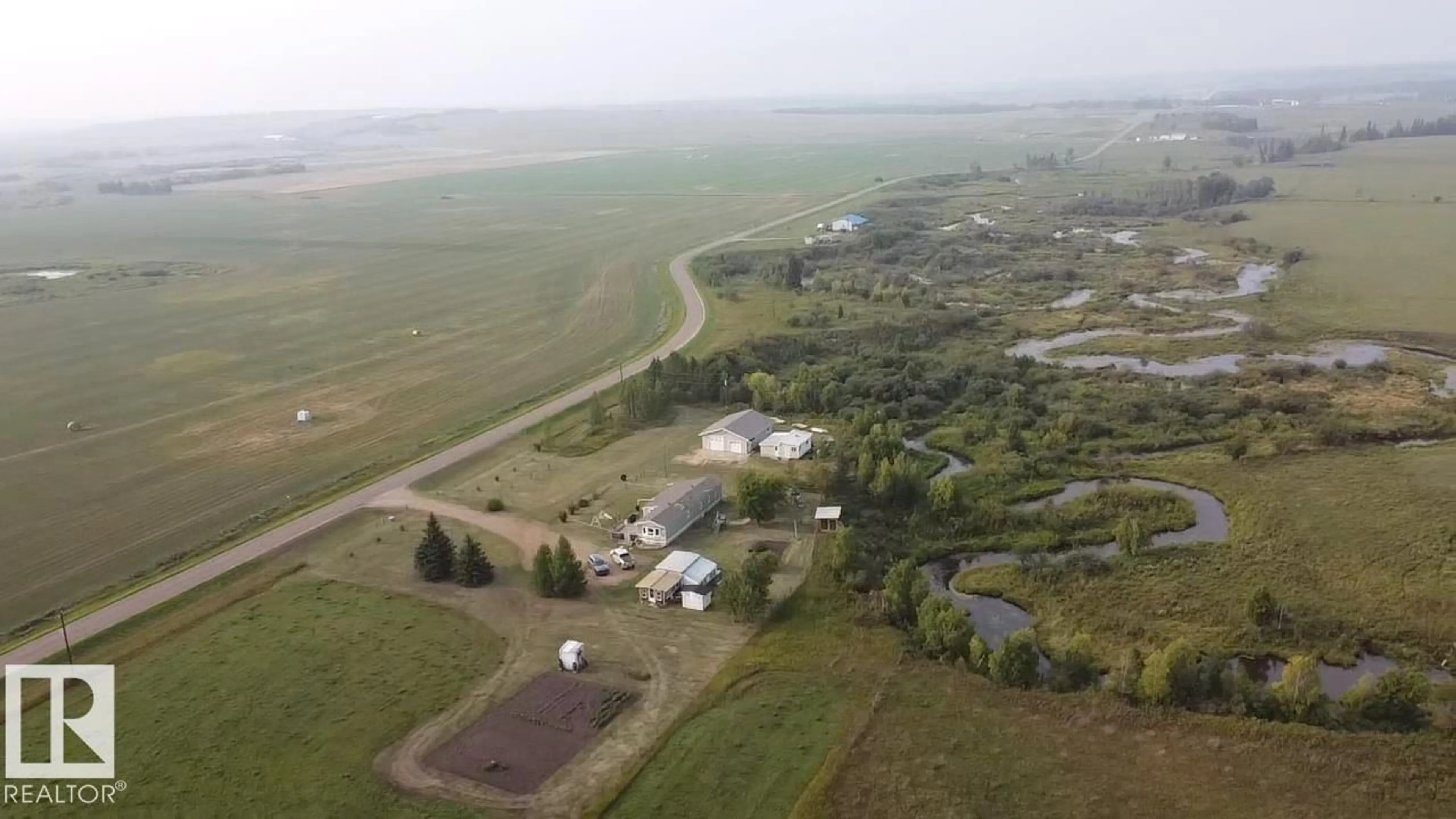 A pic from outside/outdoor area/front of a property/back of a property/a pic from drone, mountain view for 59413 RANGE 163 RD, Rural Smoky Lake County Alberta T0A3C0