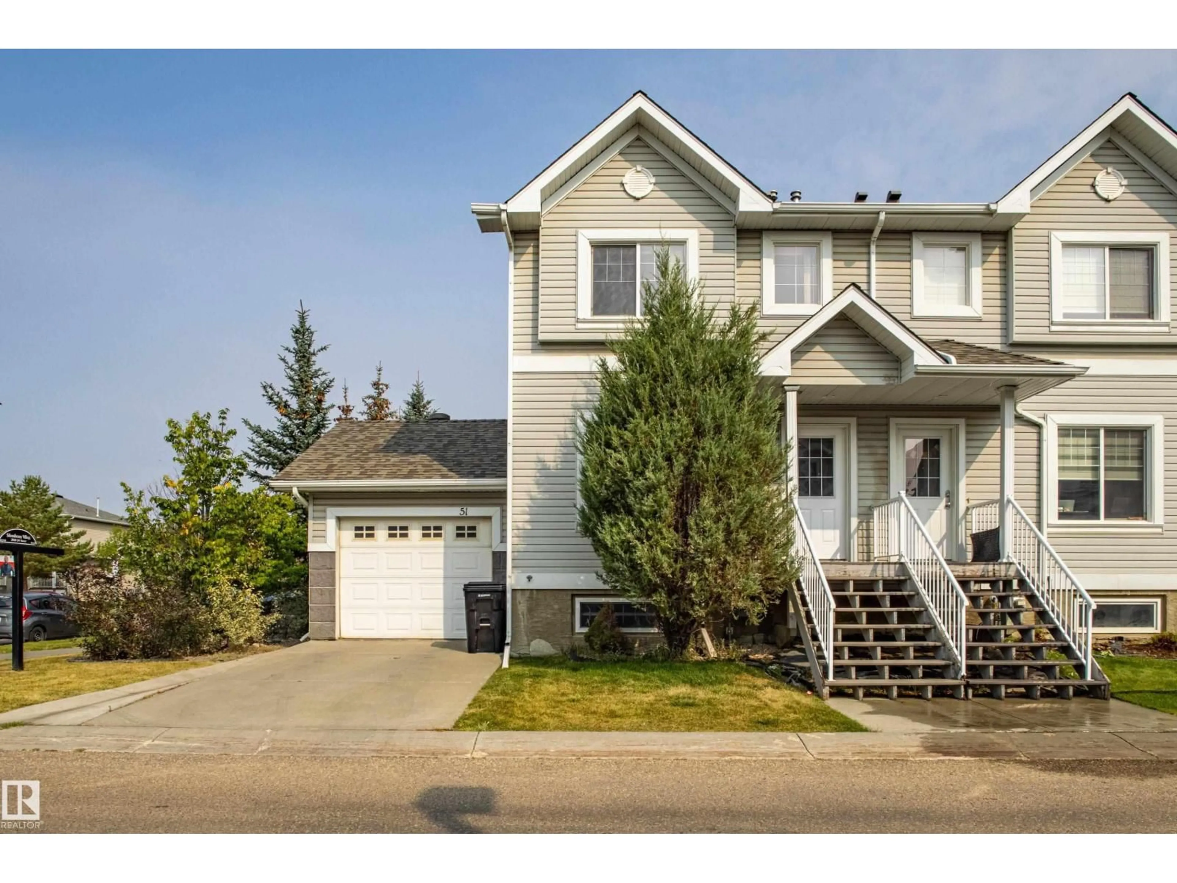 Home with vinyl exterior material, street for 51 - 2503 24 ST, Edmonton Alberta T6T0B5