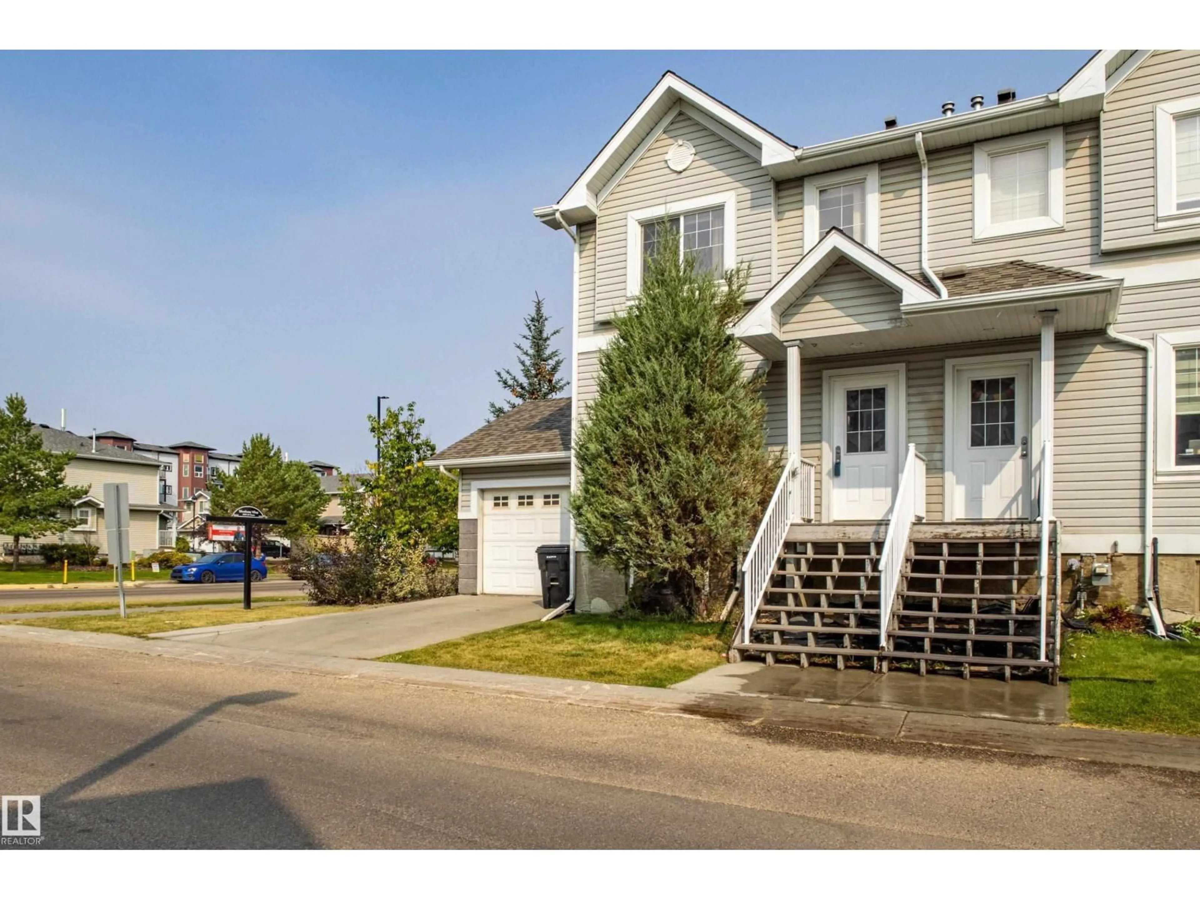 Home with vinyl exterior material, street for 51 - 2503 24 ST, Edmonton Alberta T6T0B5