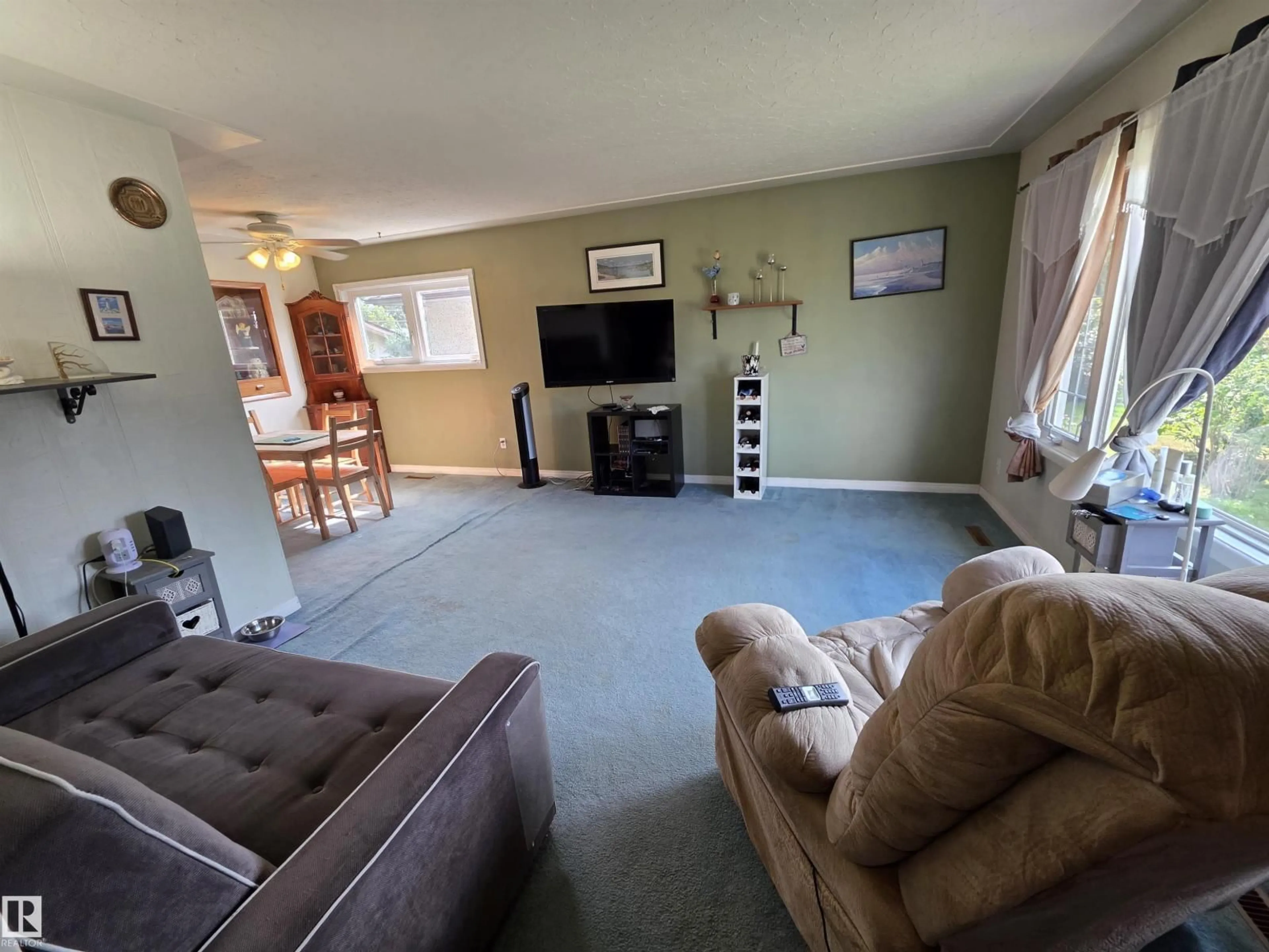 Living room with furniture, unknown for NW - 11933 50 ST, Edmonton Alberta T5W3C1