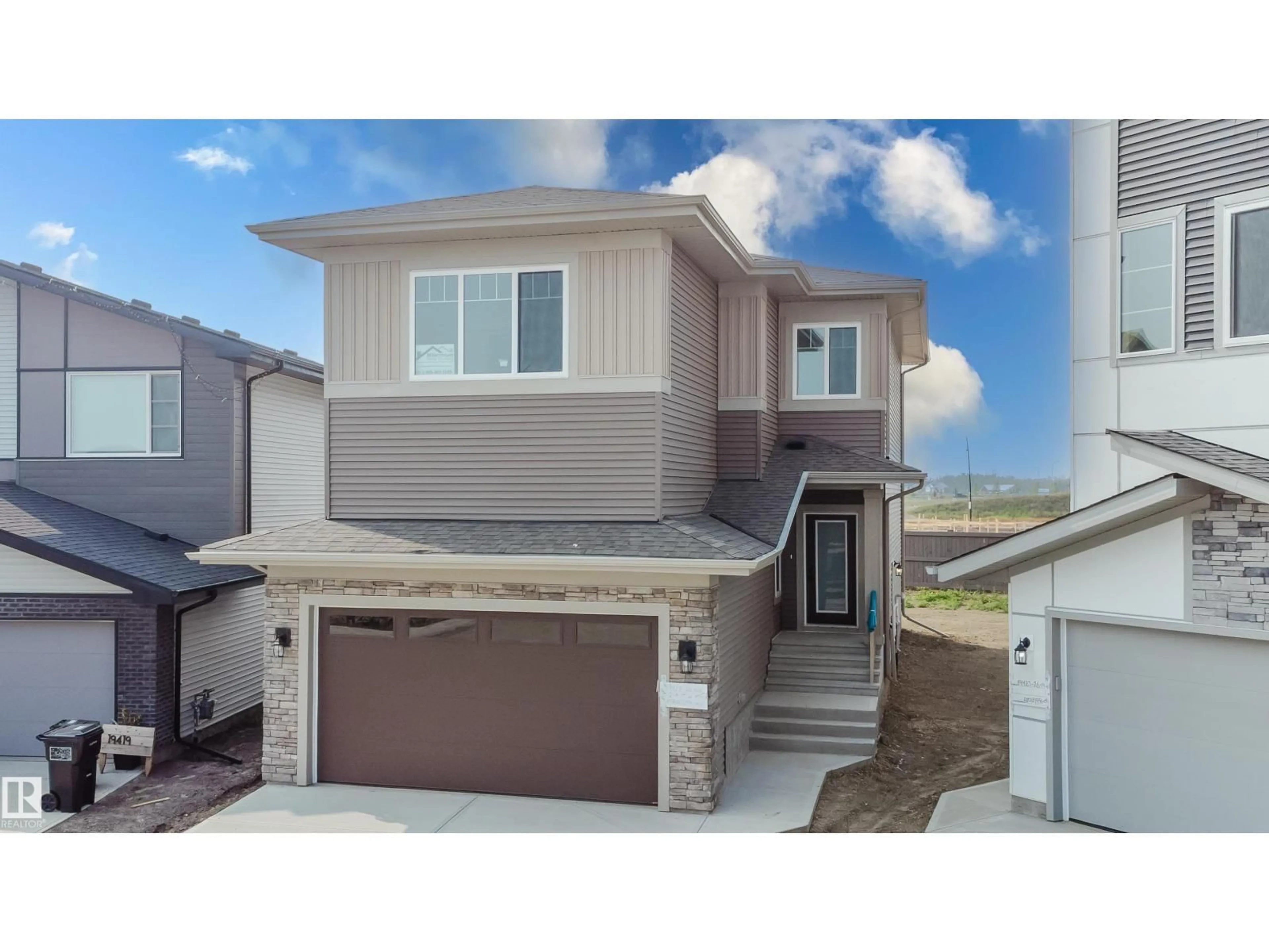 Home with vinyl exterior material, street for 19423 26 AV, Edmonton Alberta T6M1P5