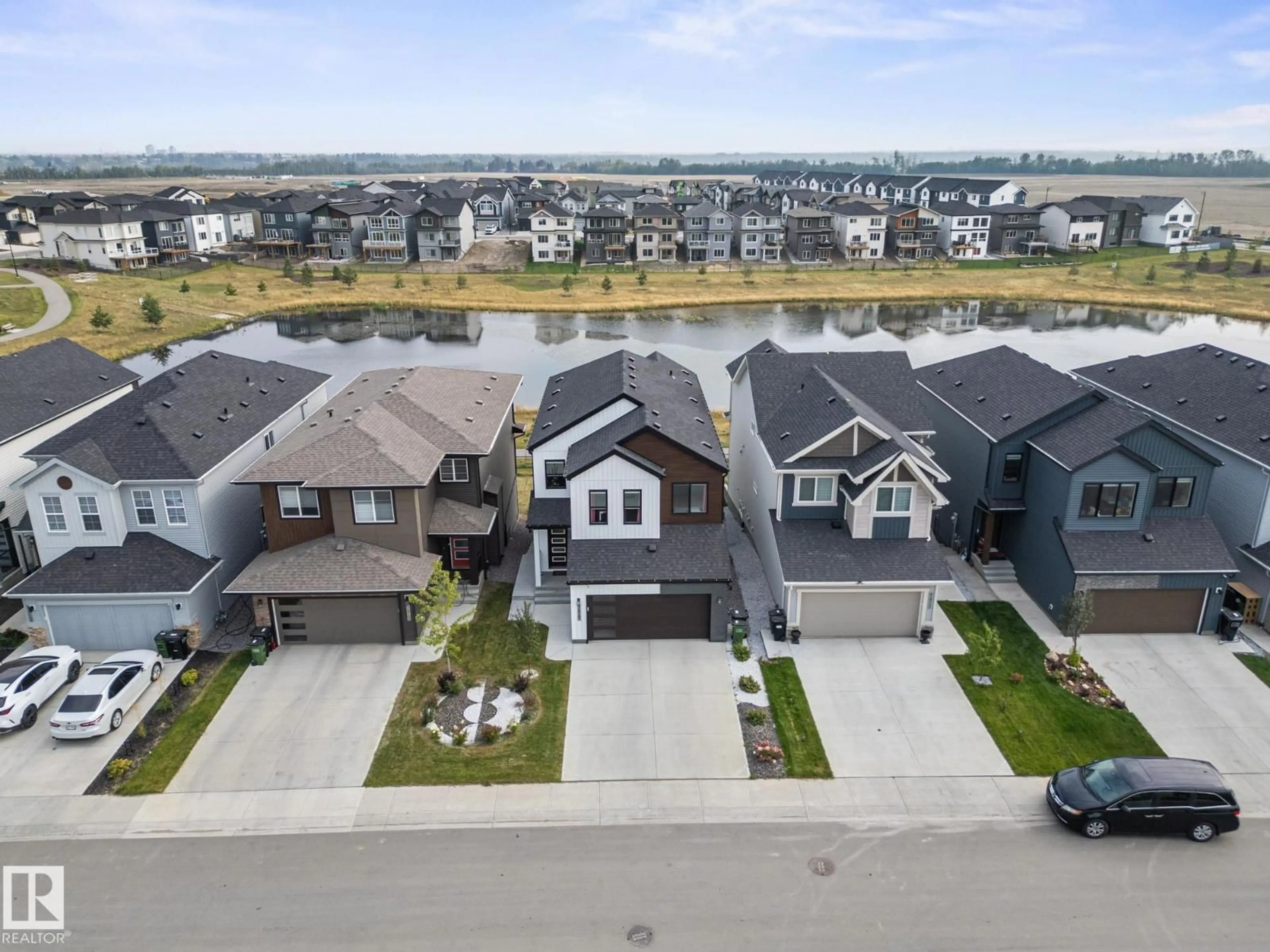 A pic from outside/outdoor area/front of a property/back of a property/a pic from drone, street for 19107 22 AV, Edmonton Alberta T6M1R1