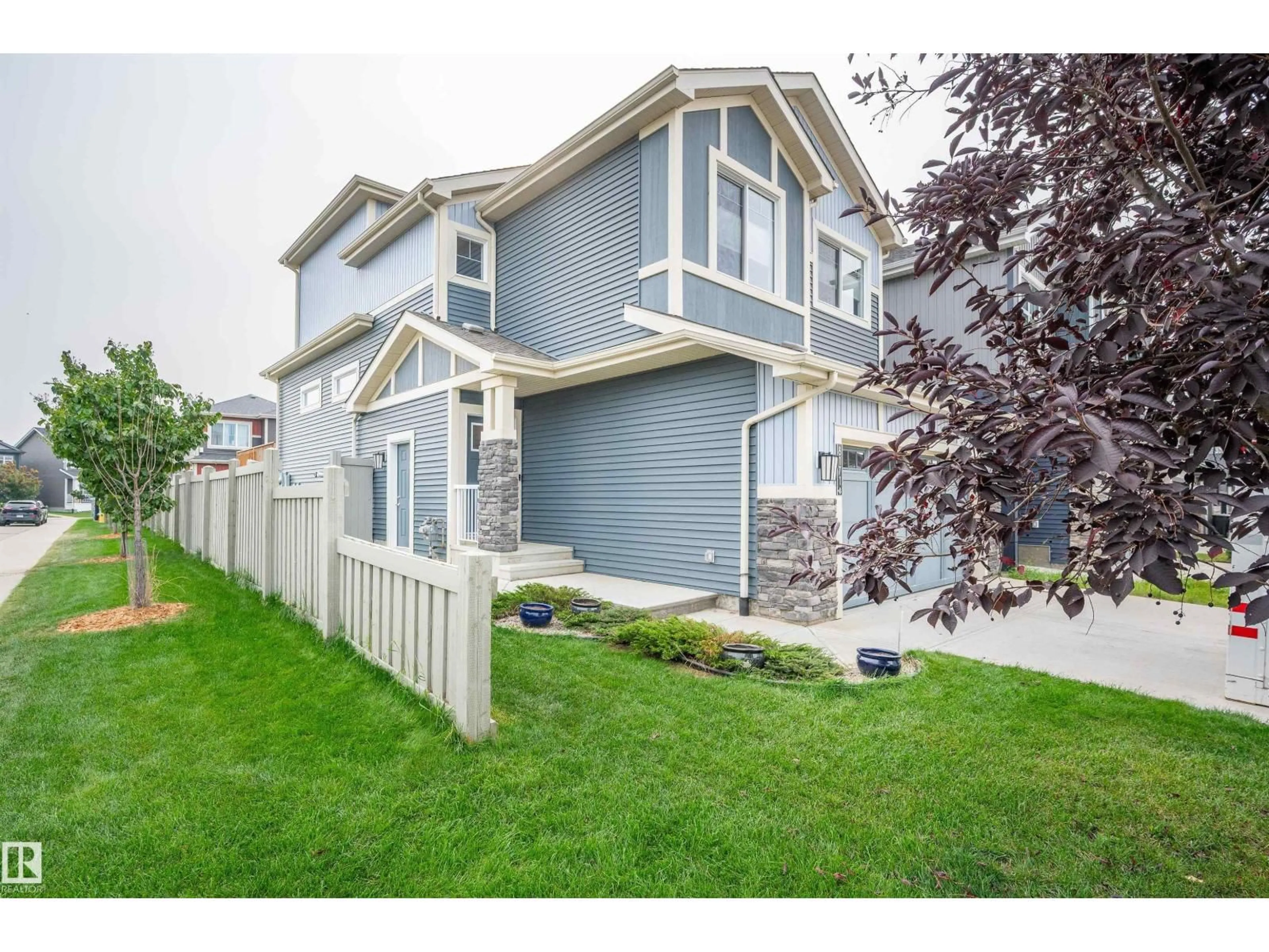 Home with vinyl exterior material, street for NW - 8171 226 ST, Edmonton Alberta T5T7G7