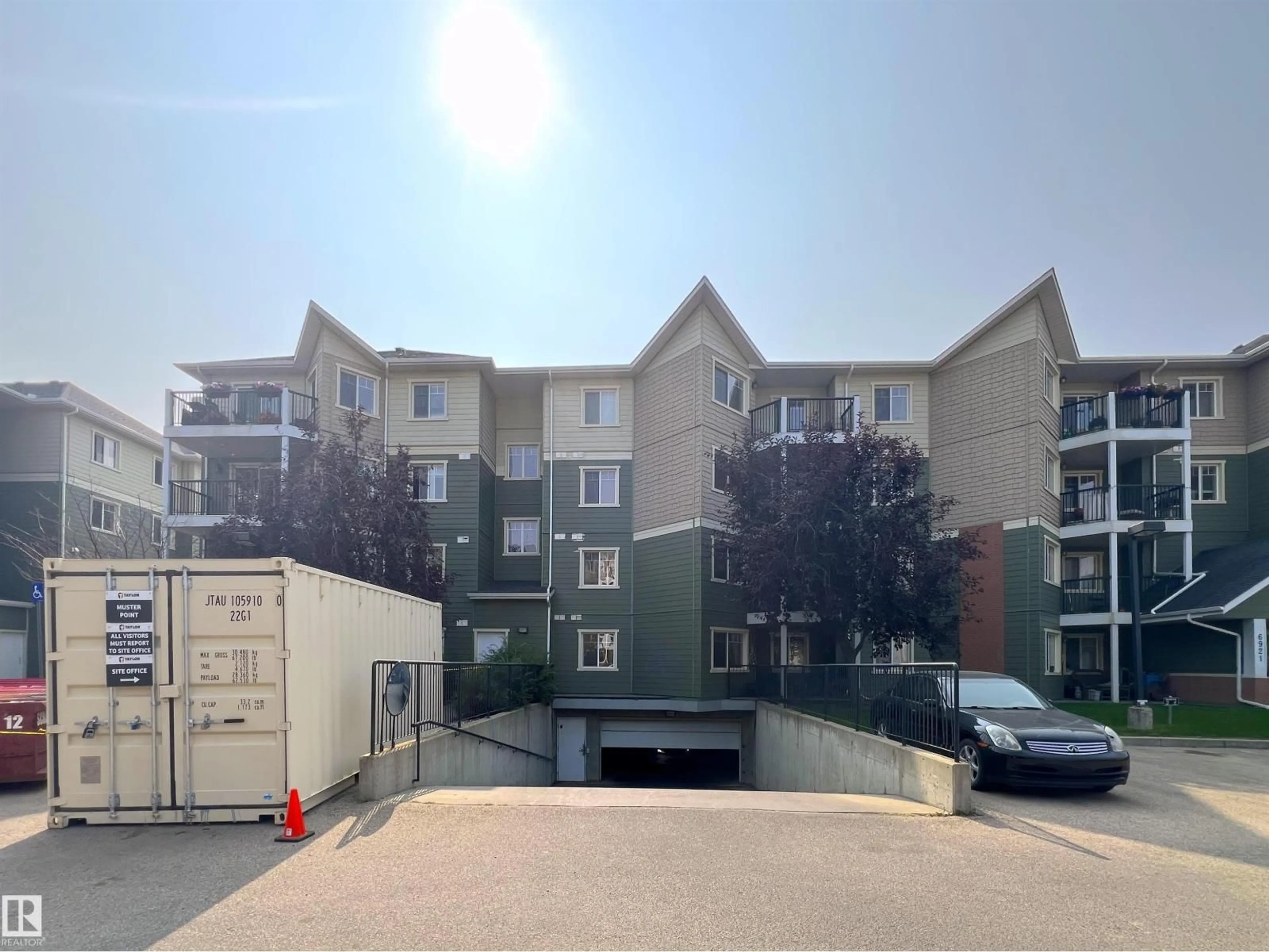A pic from outside/outdoor area/front of a property/back of a property/a pic from drone, unknown for 311 - 6925 199 ST, Edmonton Alberta T5T3X8
