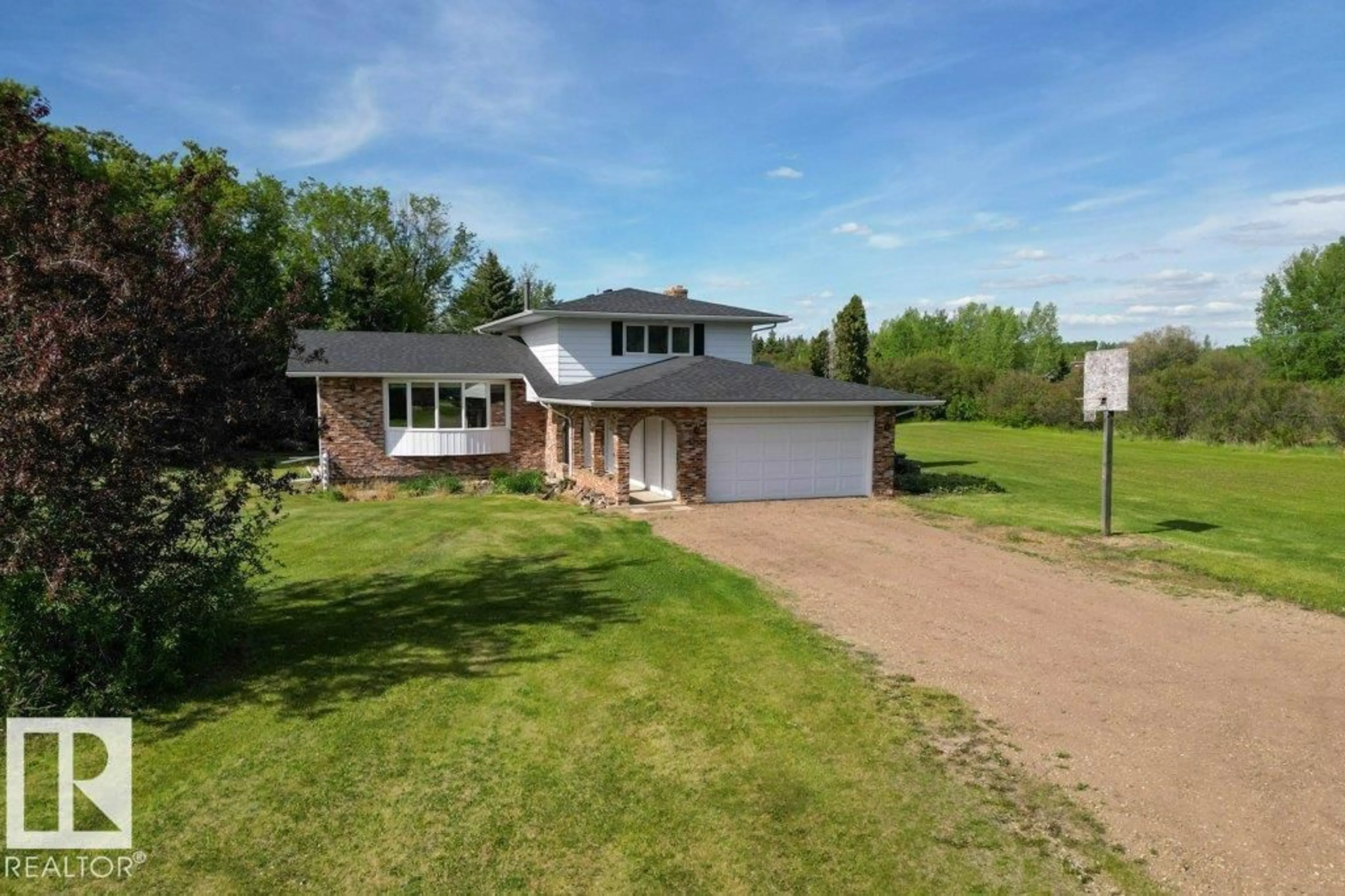 A pic from outside/outdoor area/front of a property/back of a property/a pic from drone, street for 53111 RGE ROAD 220, Rural Strathcona County Alberta T8E2C6