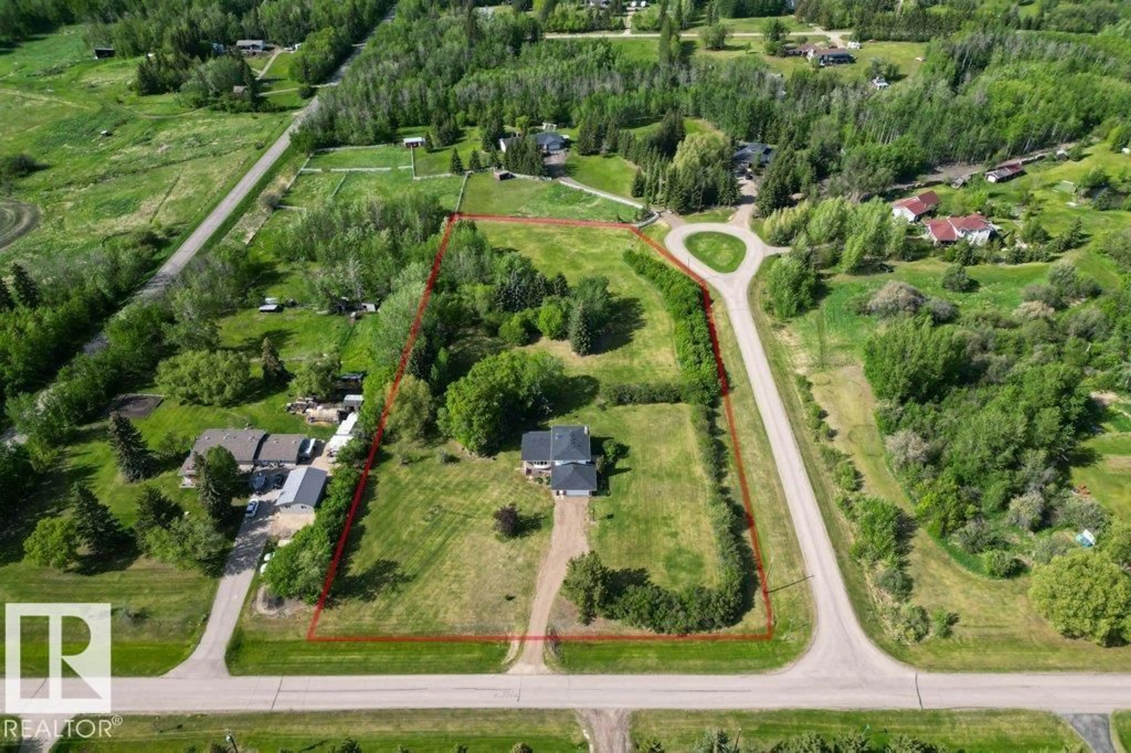 A pic from outside/outdoor area/front of a property/back of a property/a pic from drone, street for 53111 RGE ROAD 220, Rural Strathcona County Alberta T8E2C6
