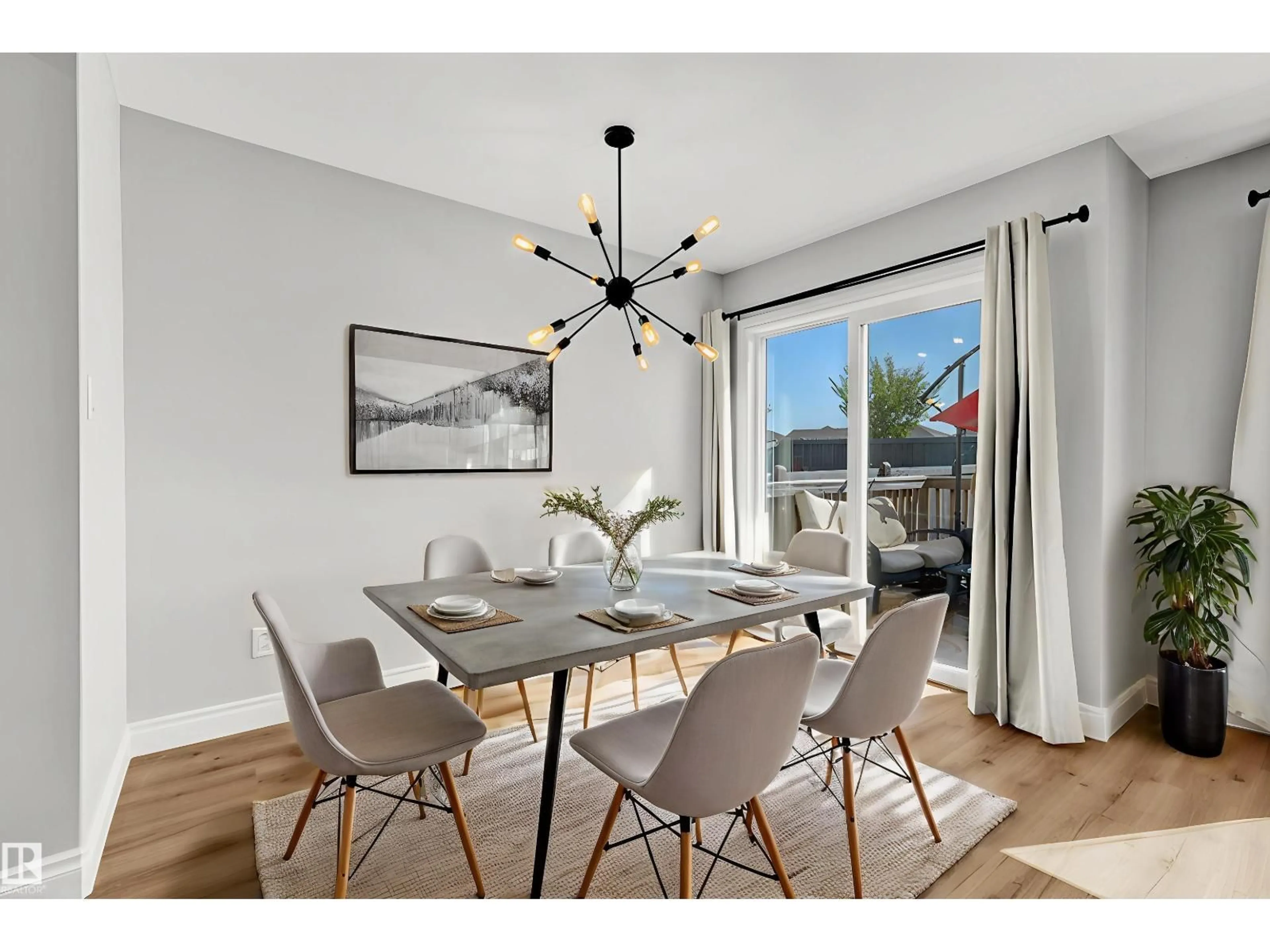 Dining room, wood/laminate floor for SW - 7273 ARMOUR CR, Edmonton Alberta T6W2S1
