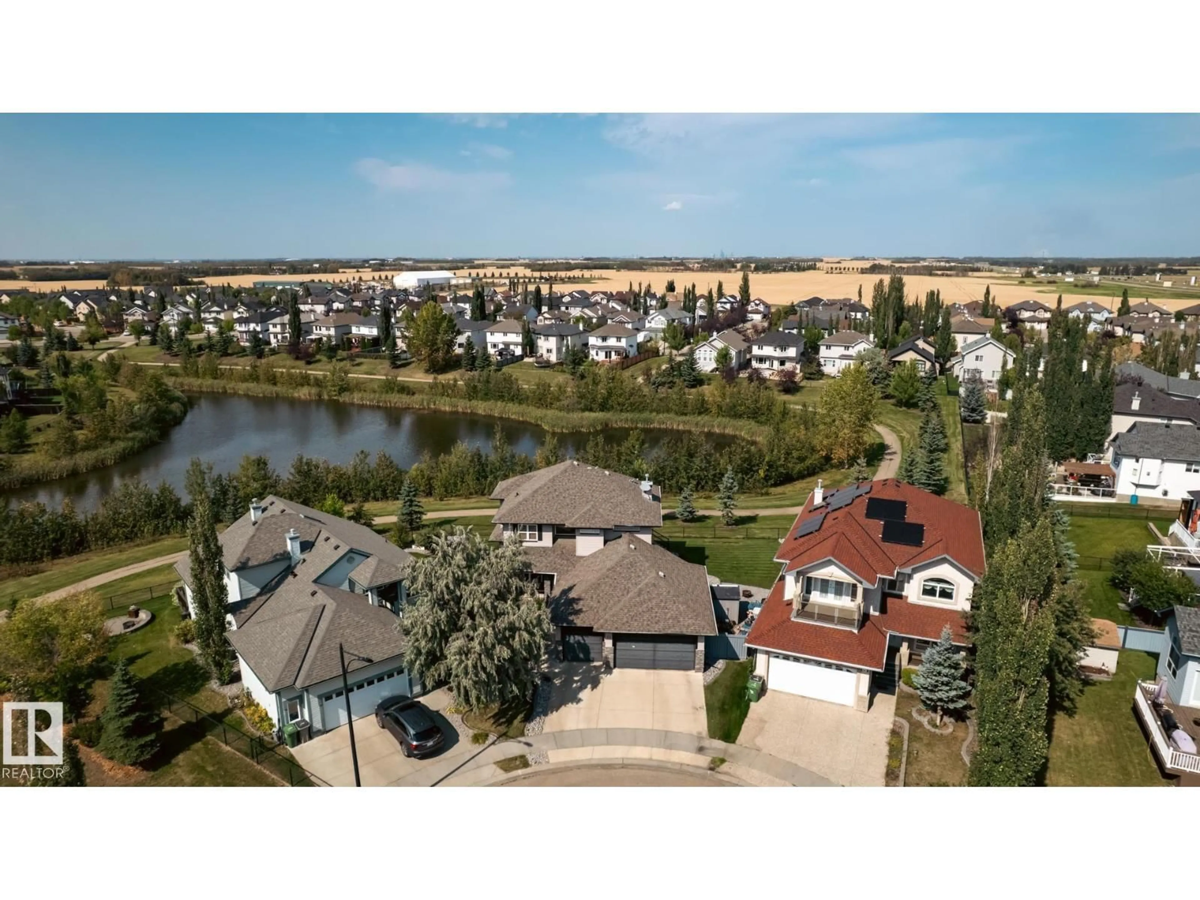 A pic from outside/outdoor area/front of a property/back of a property/a pic from drone, water/lake/river/ocean view for 52 POINTE MASSON, Beaumont Alberta T4X1S9