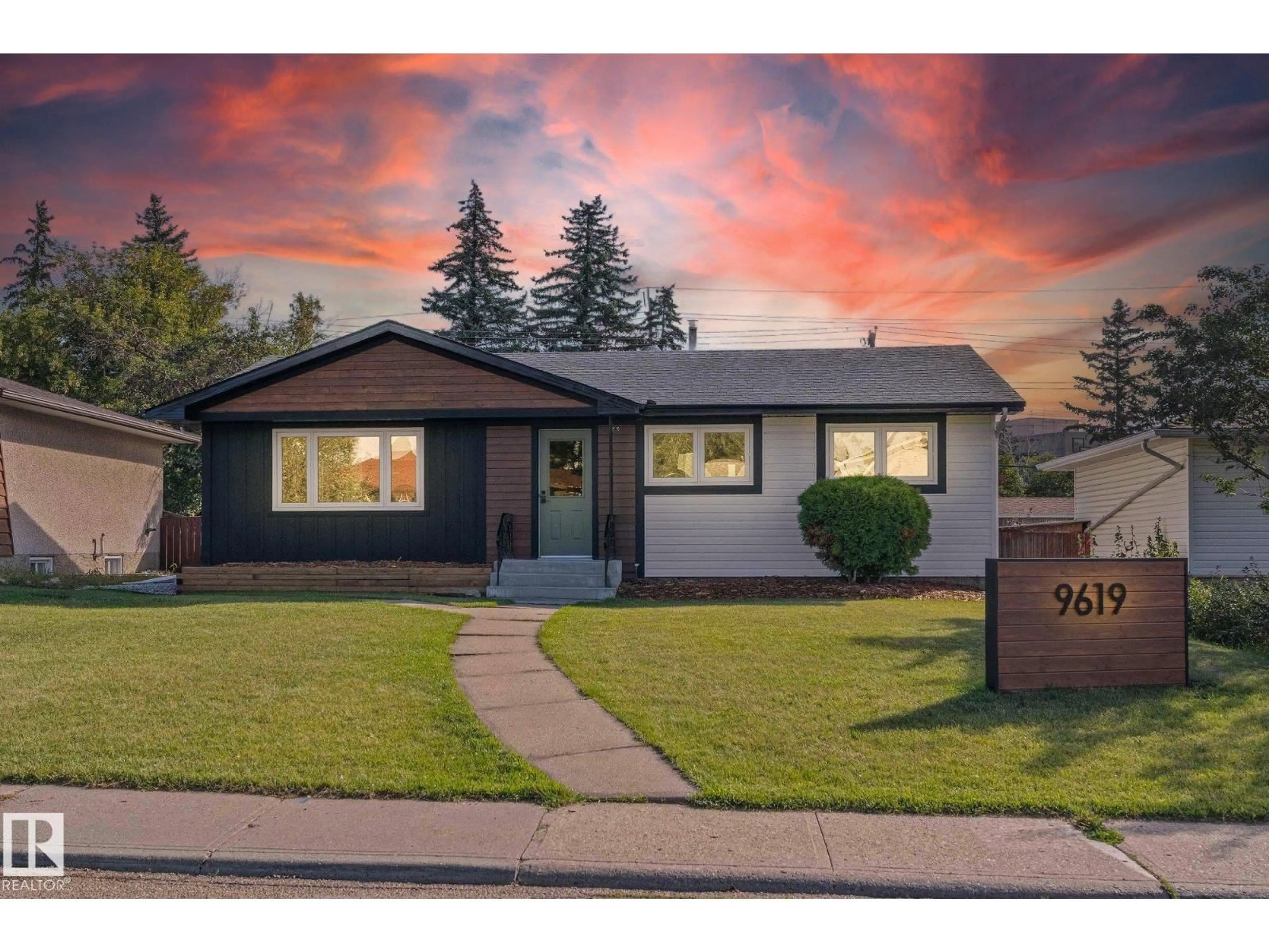 Home with vinyl exterior material, street for 9619 52 ST, Edmonton Alberta T6B1G8
