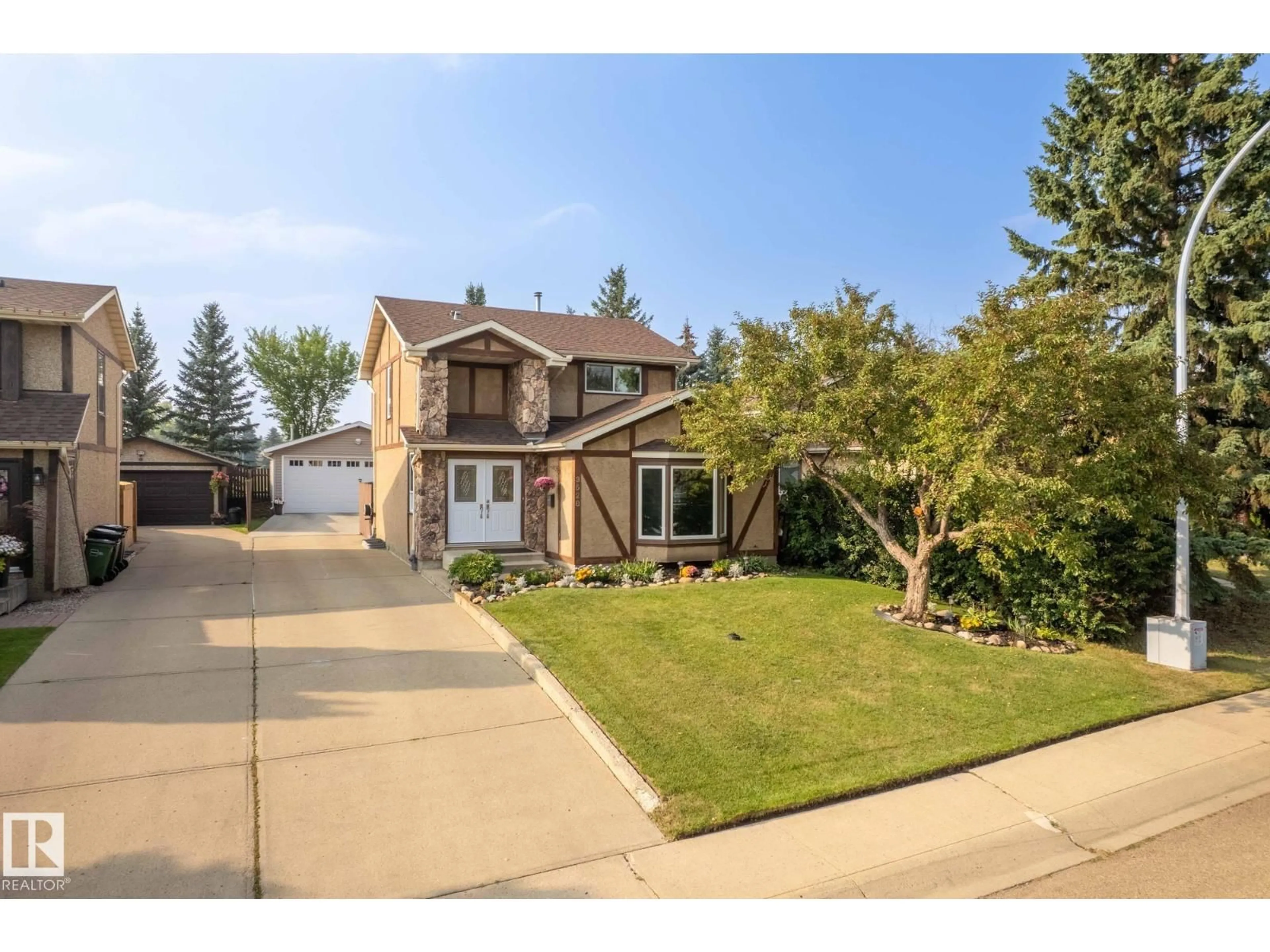 Home with vinyl exterior material, street for 3528 56 ST, Edmonton Alberta T6L2J5