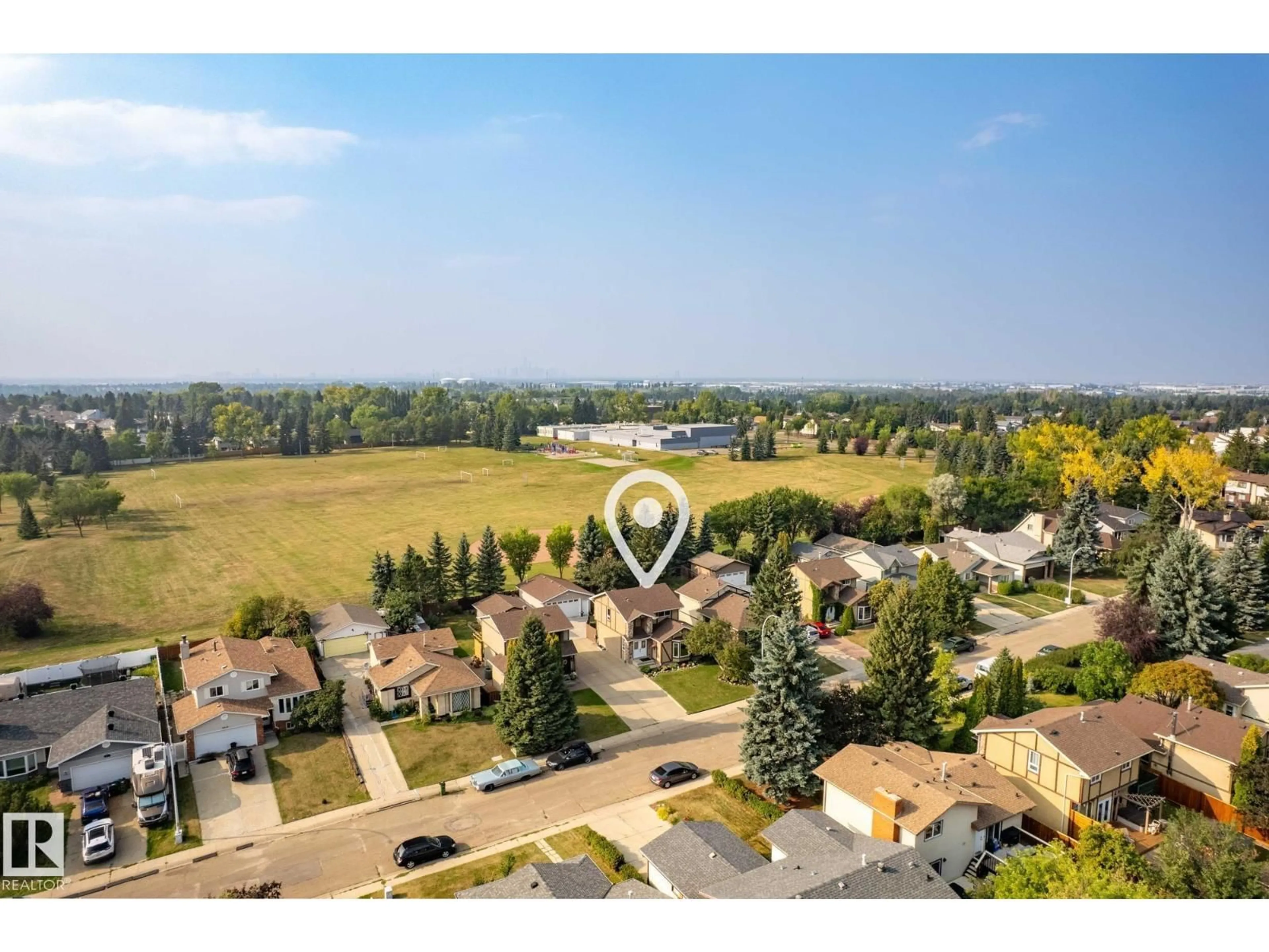 A pic from outside/outdoor area/front of a property/back of a property/a pic from drone, mountain view for 3528 56 ST, Edmonton Alberta T6L2J5