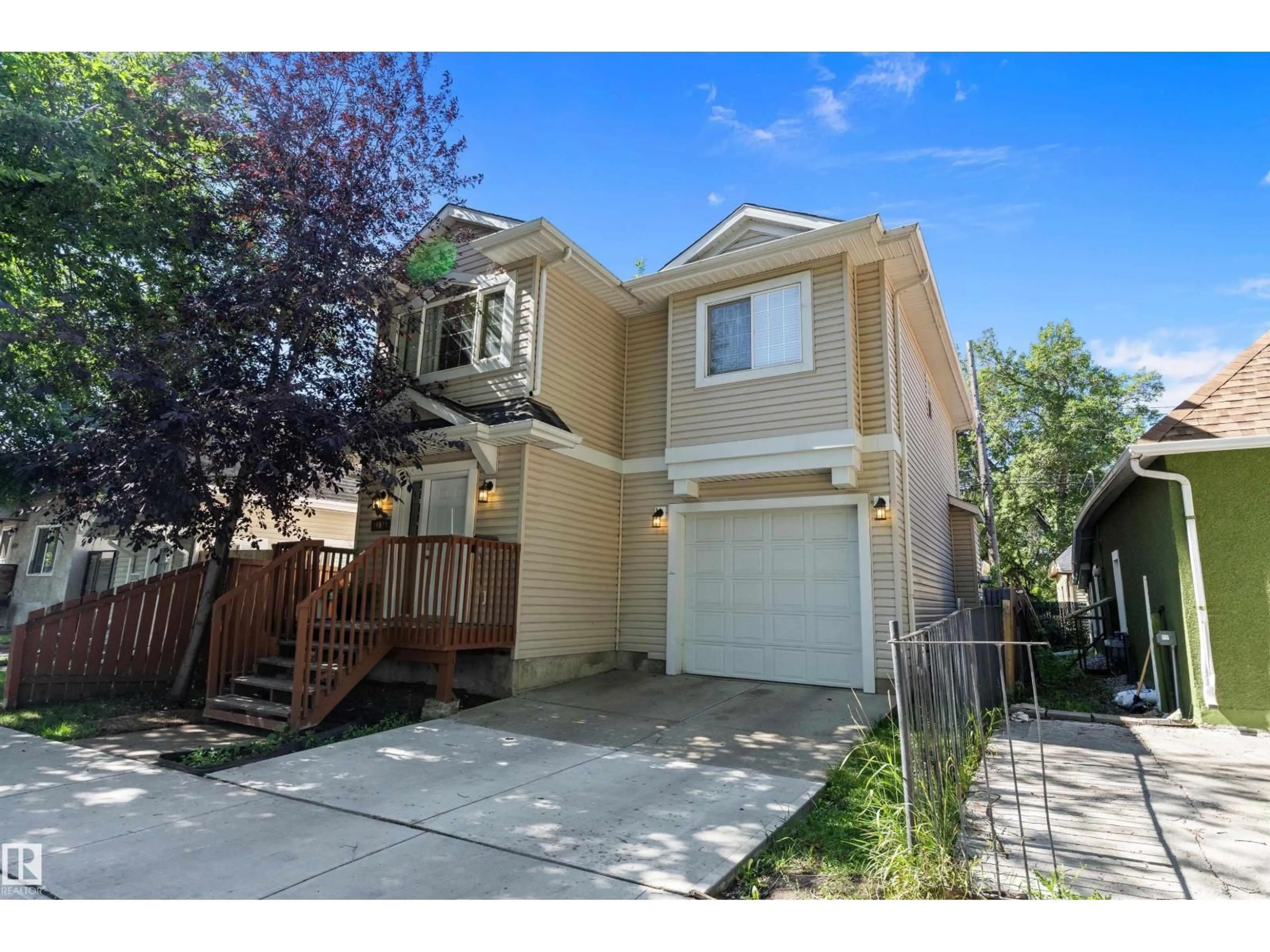 Home with vinyl exterior material, street for 10924 92 ST, Edmonton Alberta T5H1W1