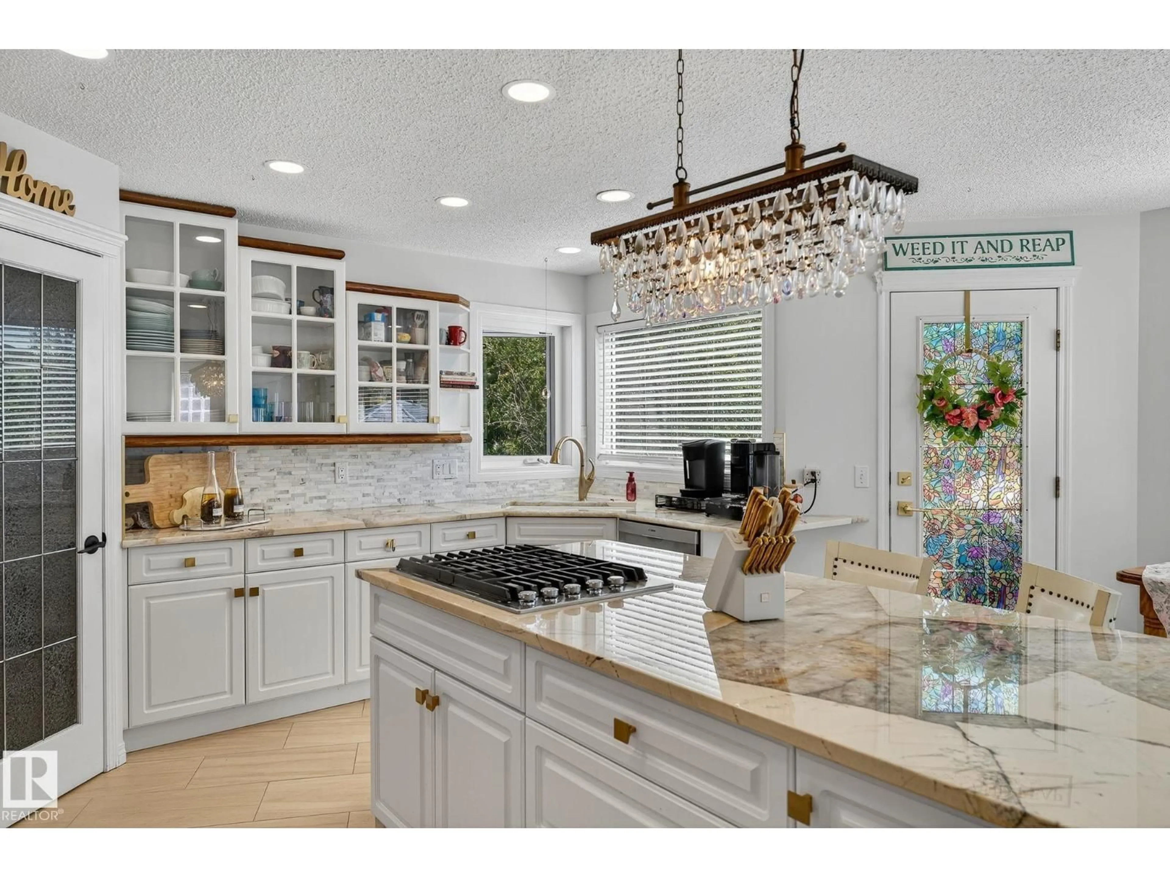 Open concept kitchen, ceramic/tile floor for 1103 117 ST, Edmonton Alberta T6J7C3