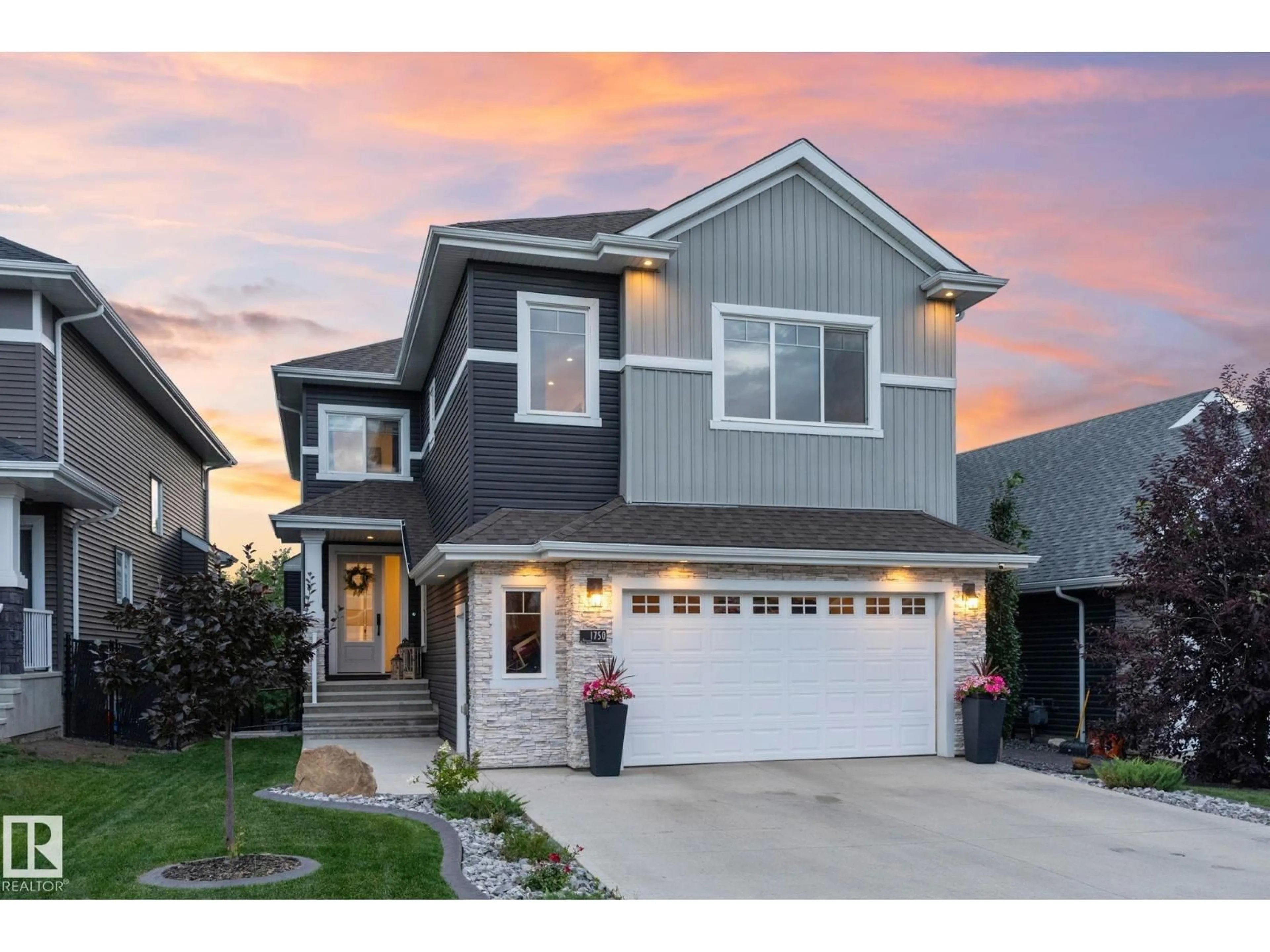 Home with vinyl exterior material, street for 1750 TANAGER CL, Edmonton Alberta T5S0M5