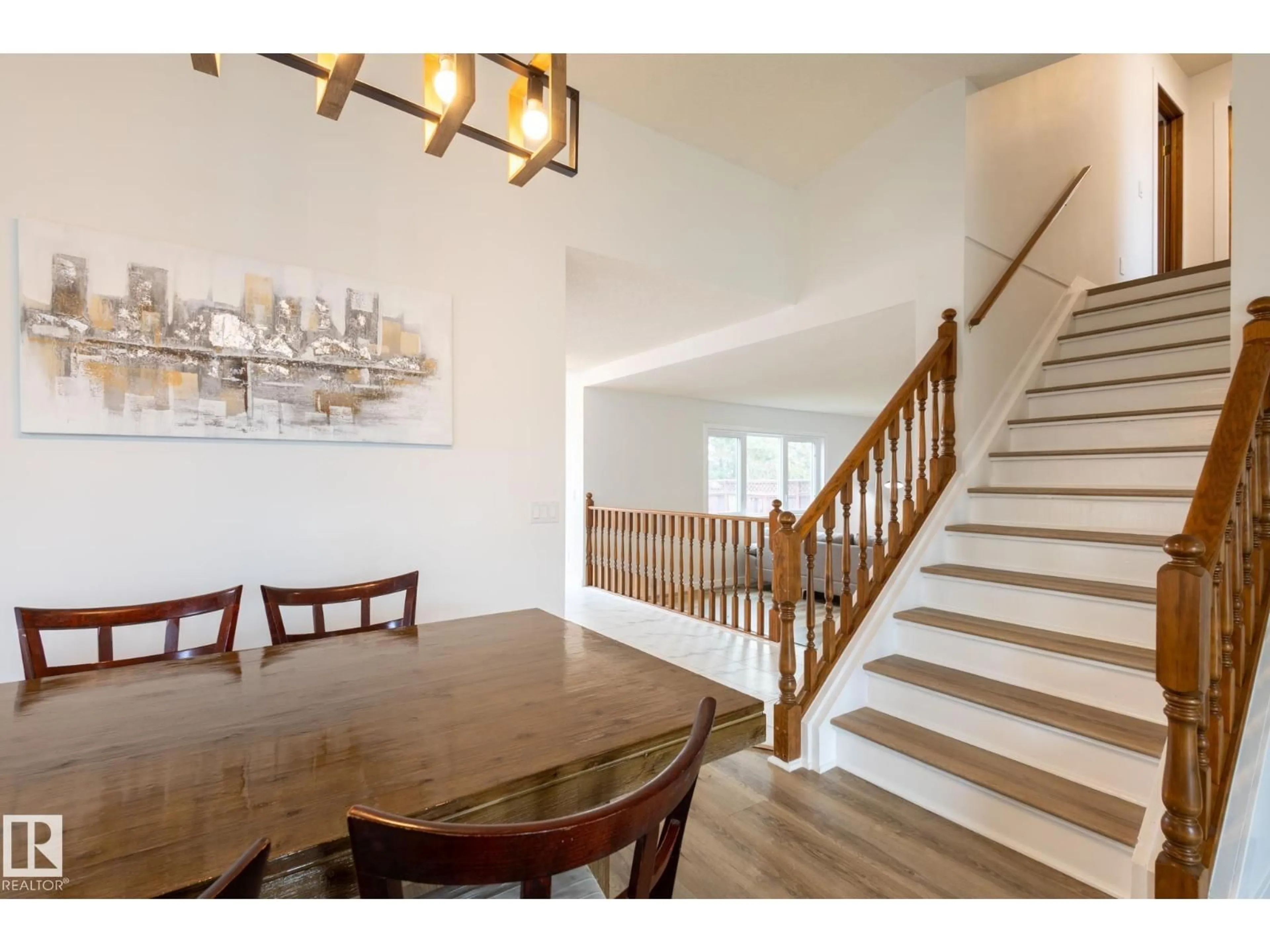 Dining room, wood/laminate floor for 7640 158A AV, Edmonton Alberta T5Z2V8