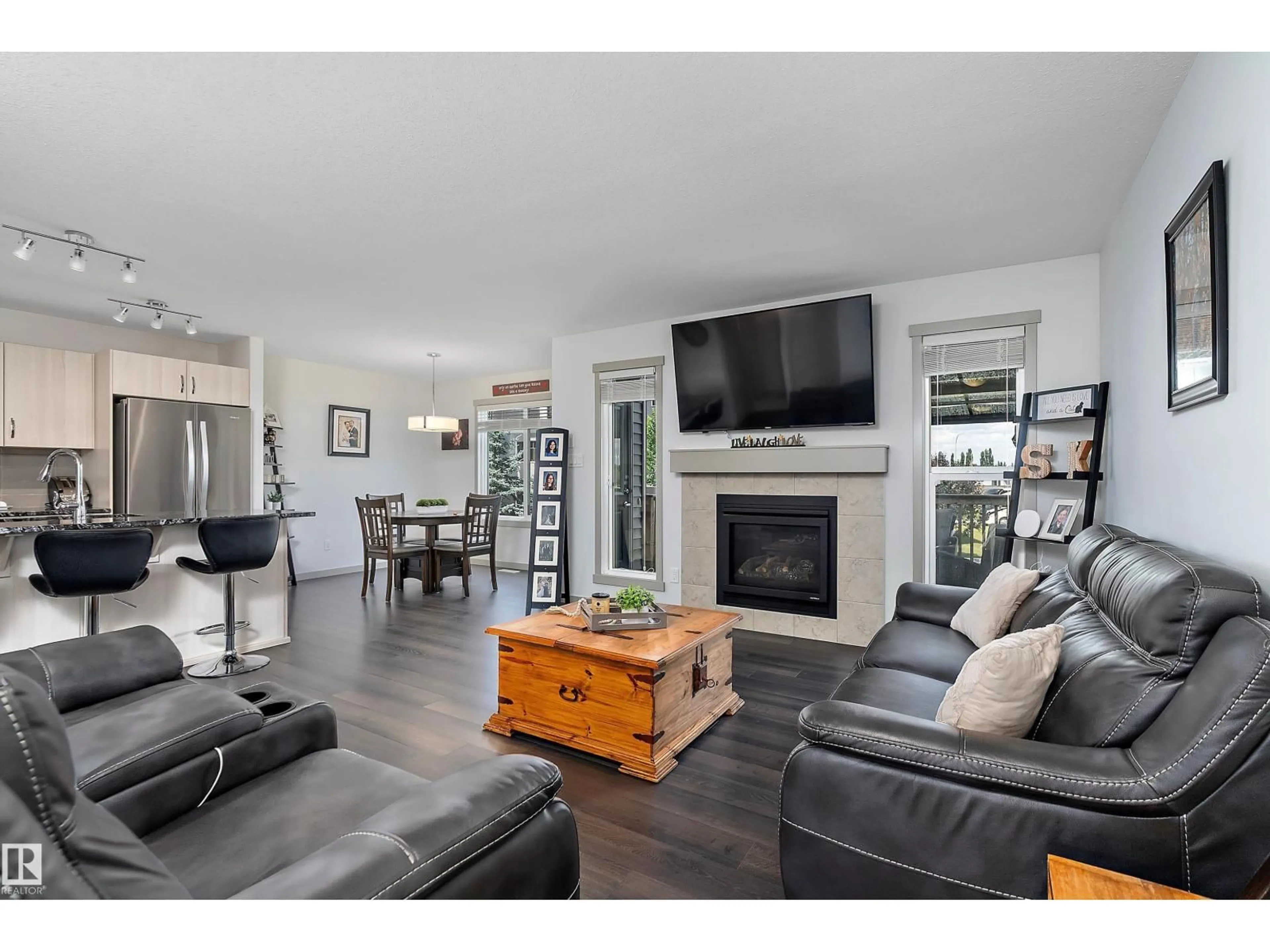 Living room with furniture, wood/laminate floor for 1817 WESTERRA LO, Stony Plain Alberta T7Z0L8