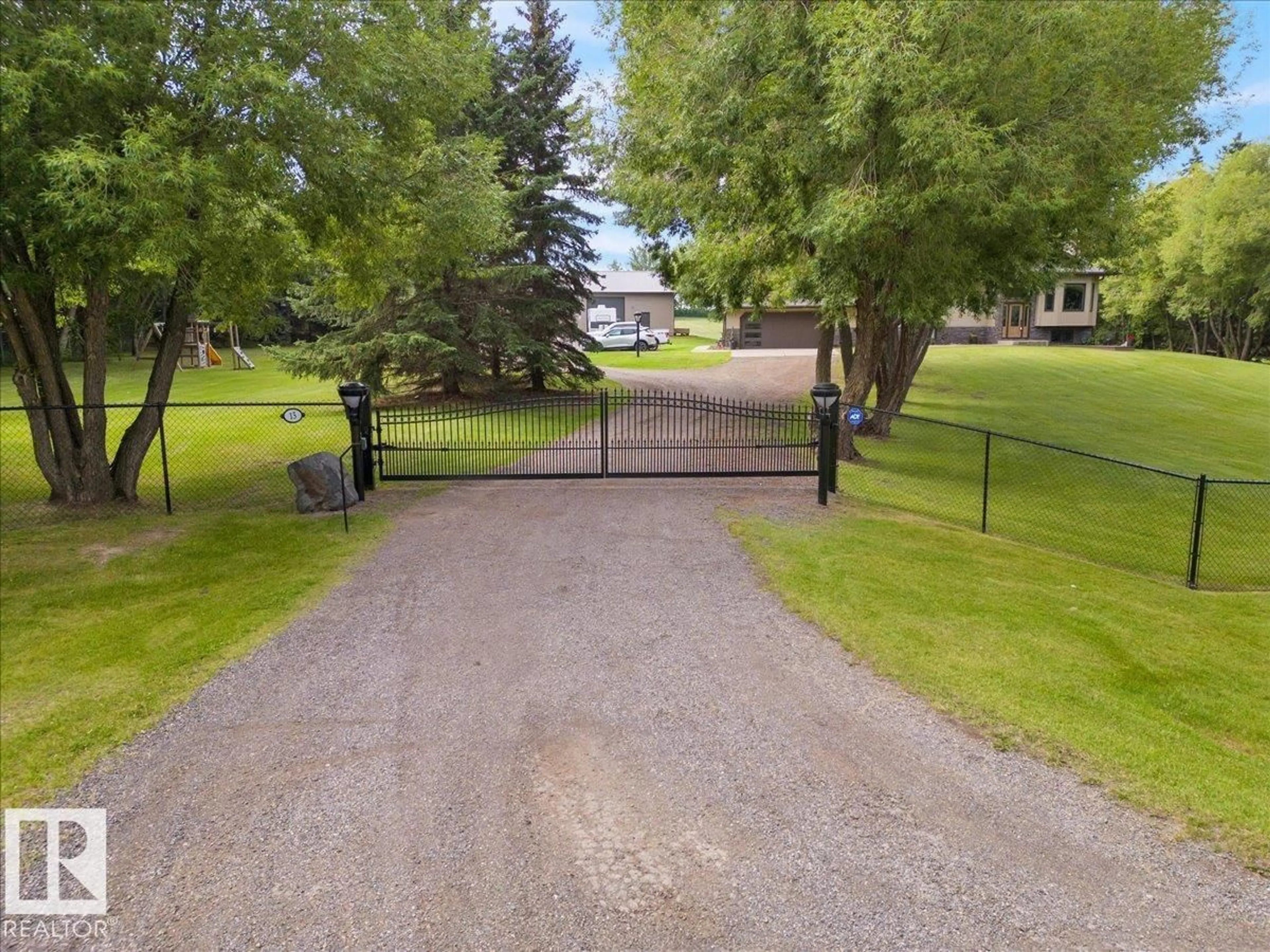 A pic from outside/outdoor area/front of a property/back of a property/a pic from drone, street for 53503 - 15 RGE ROAD 274, Rural Parkland County Alberta T7X3R9