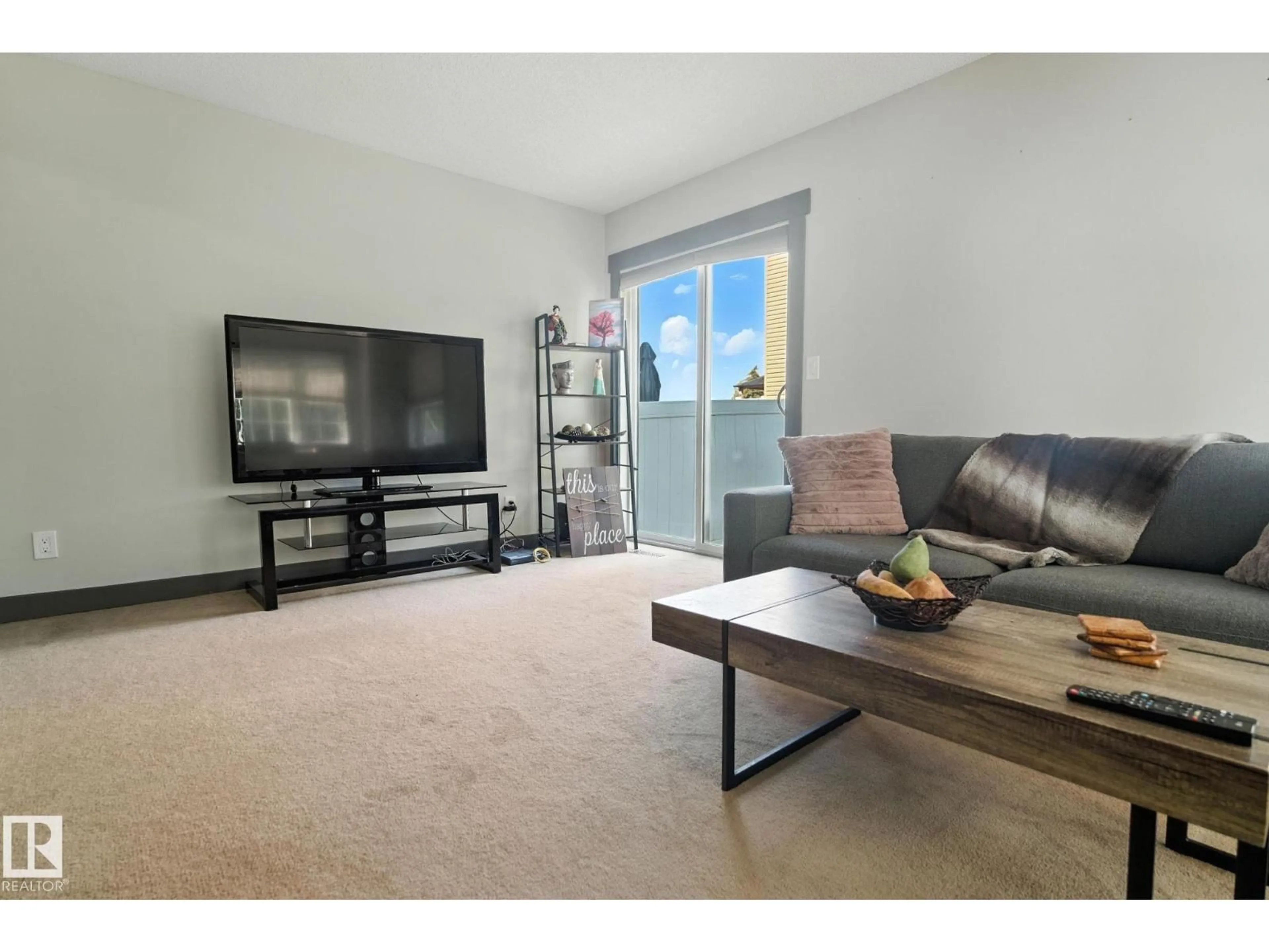 Living room with furniture, unknown for NW - 18004 89 ST, Edmonton Alberta T5Z0E7