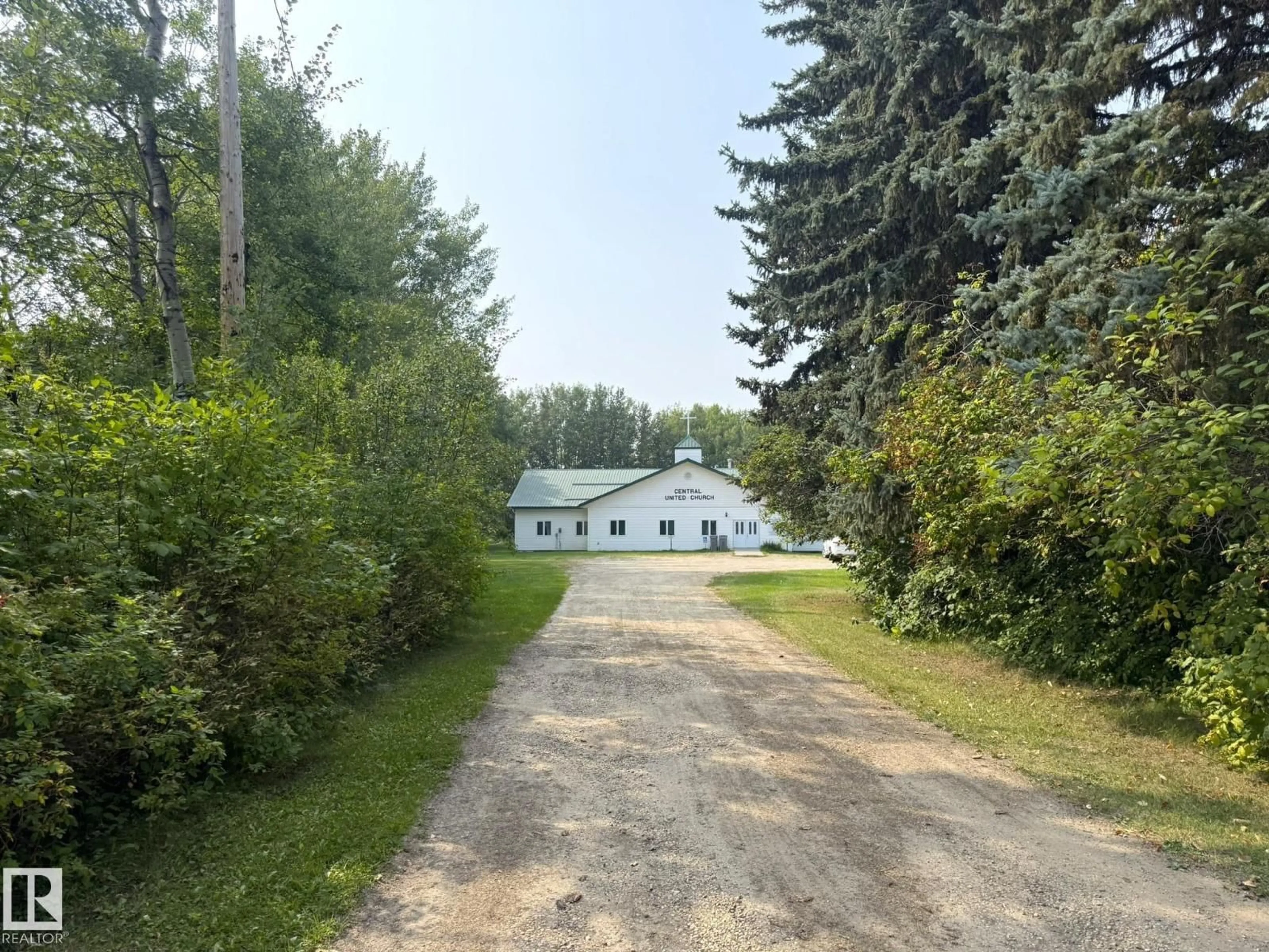 A pic from outside/outdoor area/front of a property/back of a property/a pic from drone, street for 5112 53 ST, Warburg Alberta T0C2T0