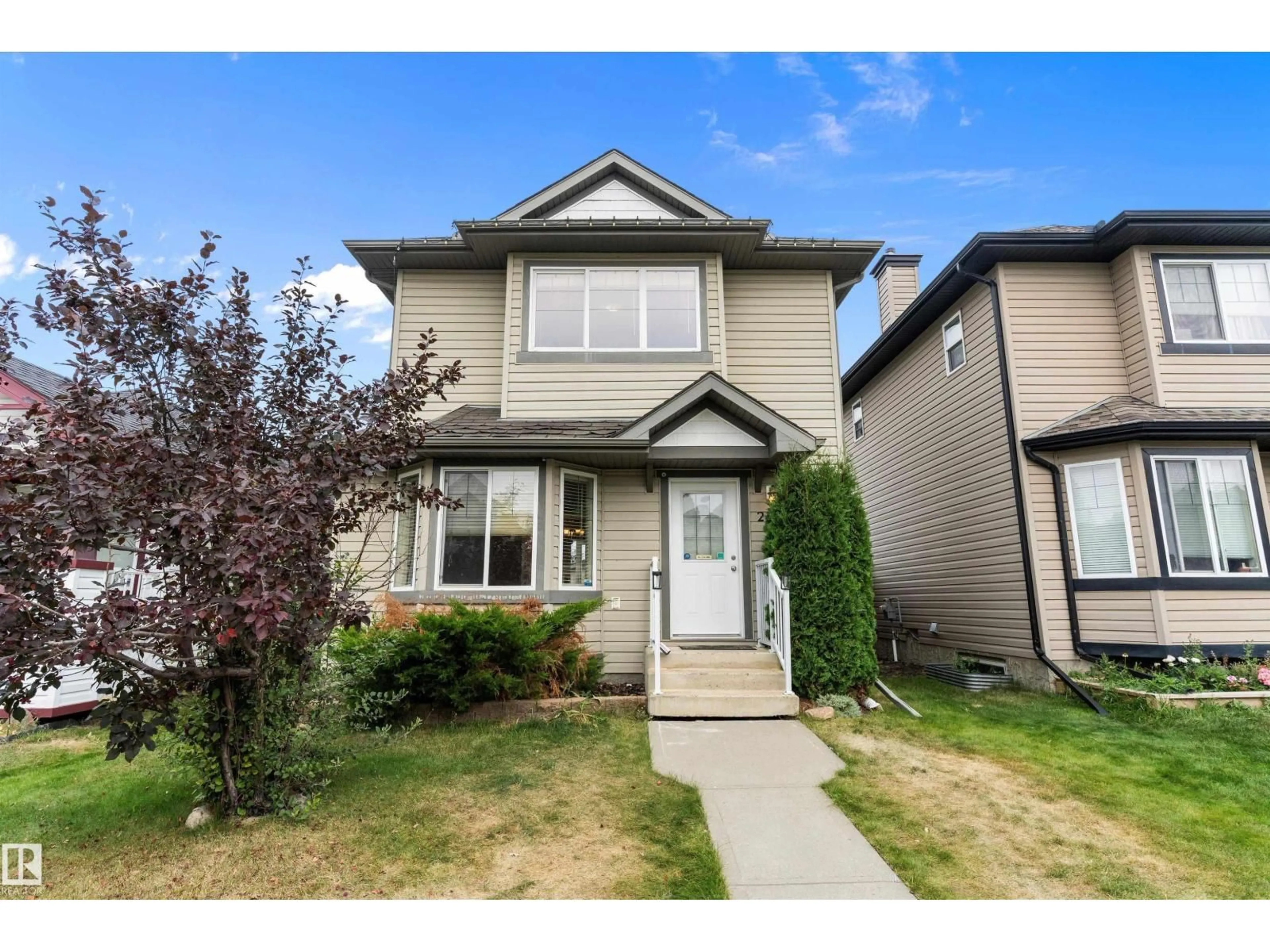 Home with vinyl exterior material, street for 2330 29A AV, Edmonton Alberta T6T2B1