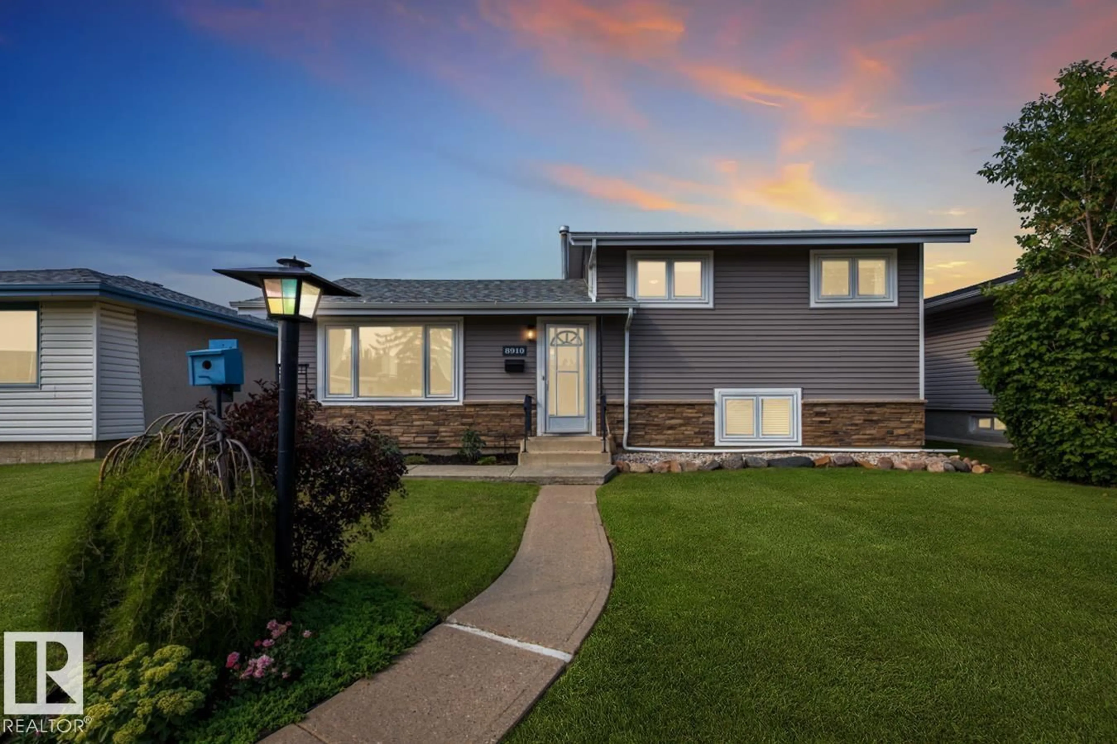 Home with vinyl exterior material, street for 8910 162 ST, Edmonton Alberta T5R2M4