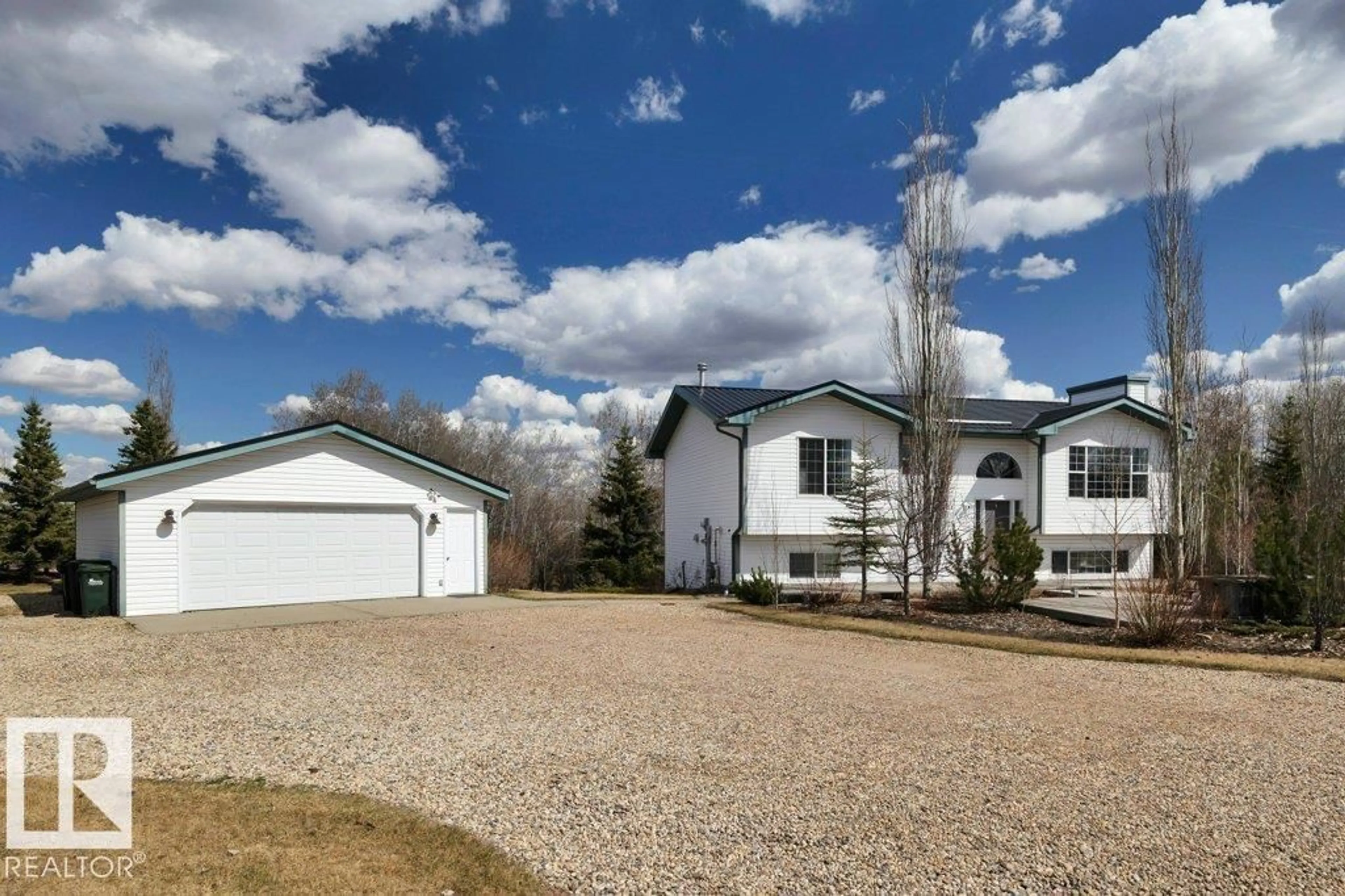 A pic from outside/outdoor area/front of a property/back of a property/a pic from drone, street for 52411 - 26 RGE RD 214, Rural Strathcona County Alberta T8E2G8