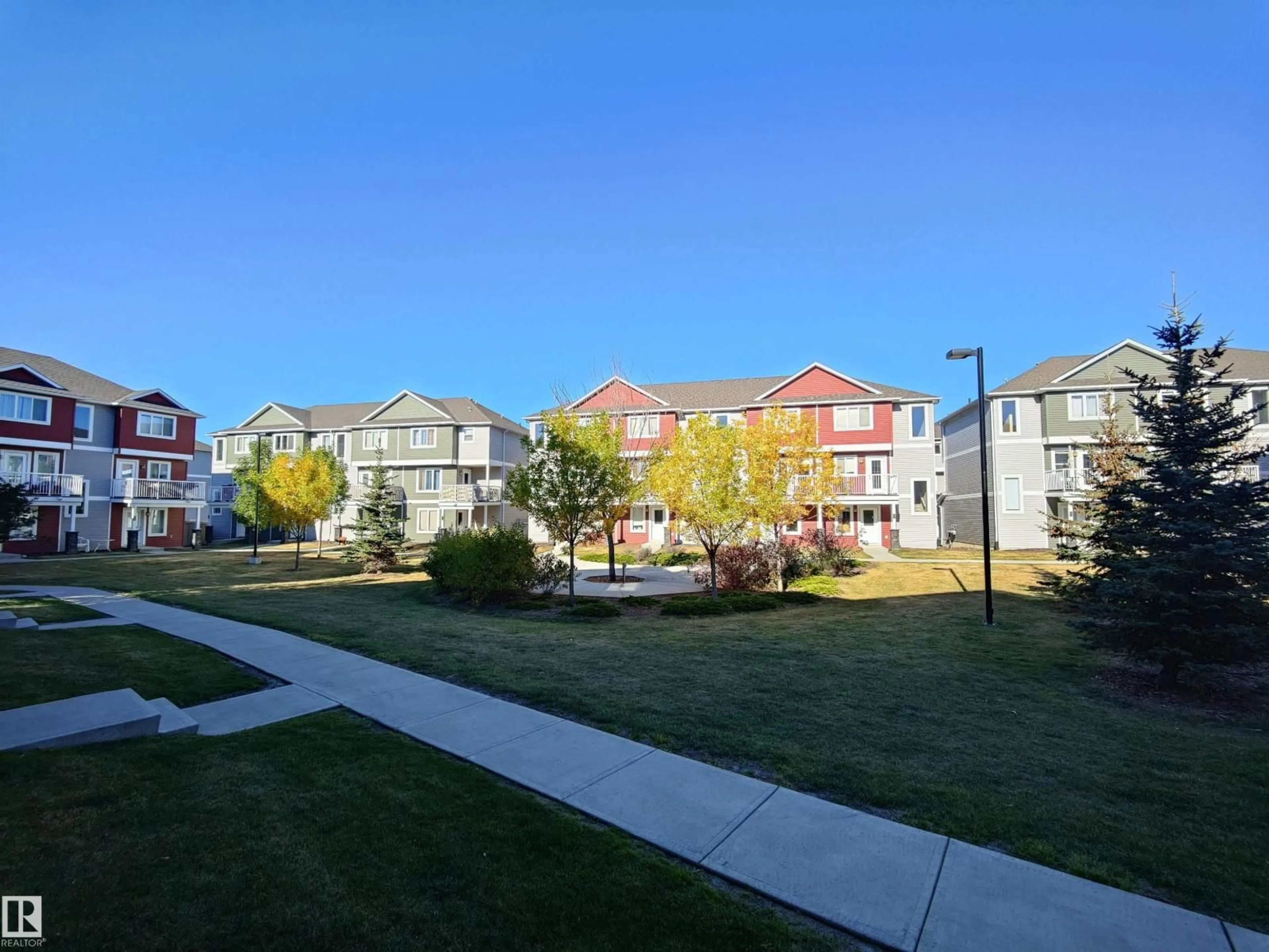 A pic from outside/outdoor area/front of a property/back of a property/a pic from drone, mountain view for #46 - 1816 RUTHERFORD RD, Edmonton Alberta T6W2K6
