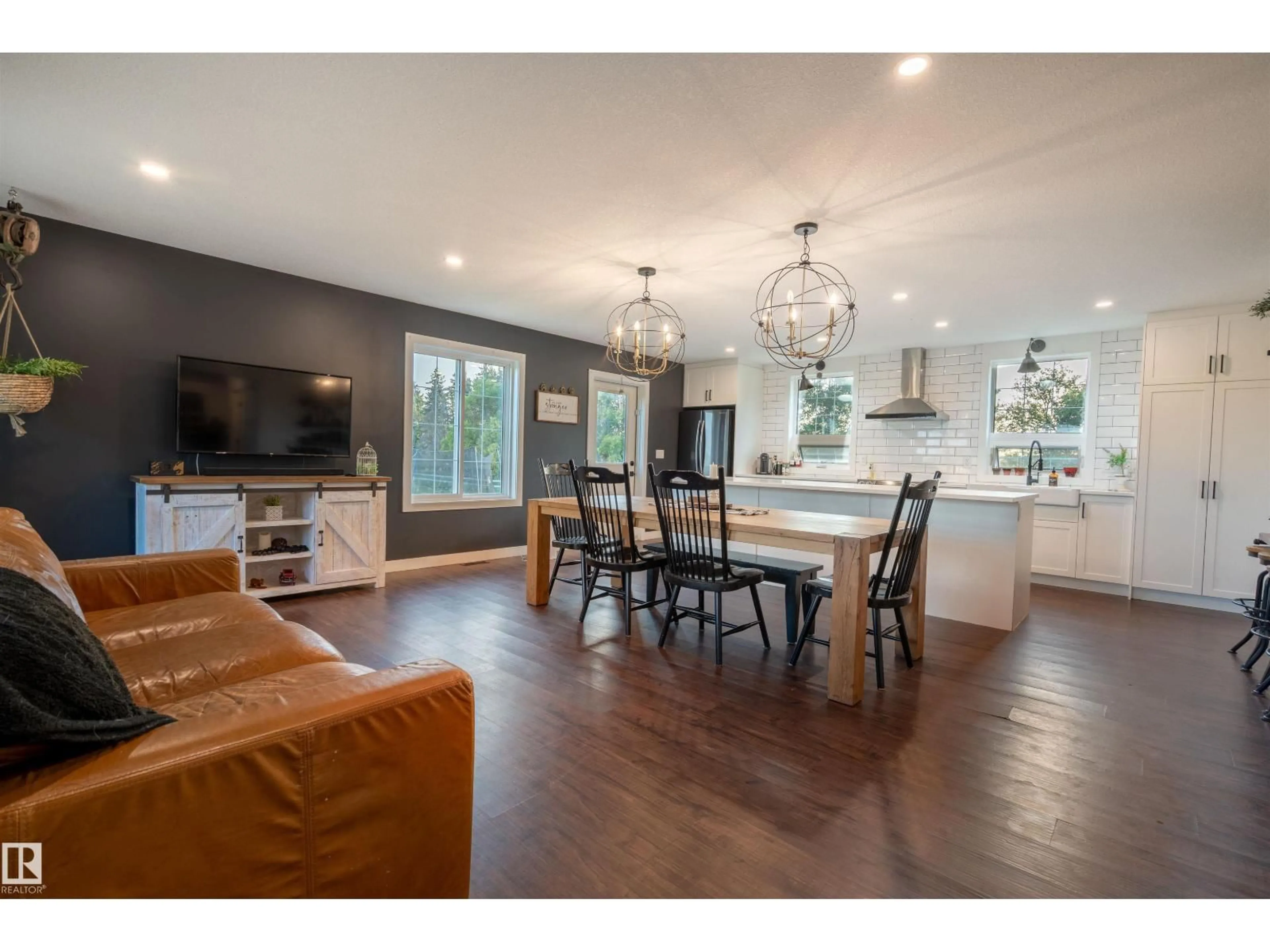 Open concept kitchen, wood/laminate floor for 261015 HWY 616, Rural Wetaskiwin County Alberta T0C1Z0