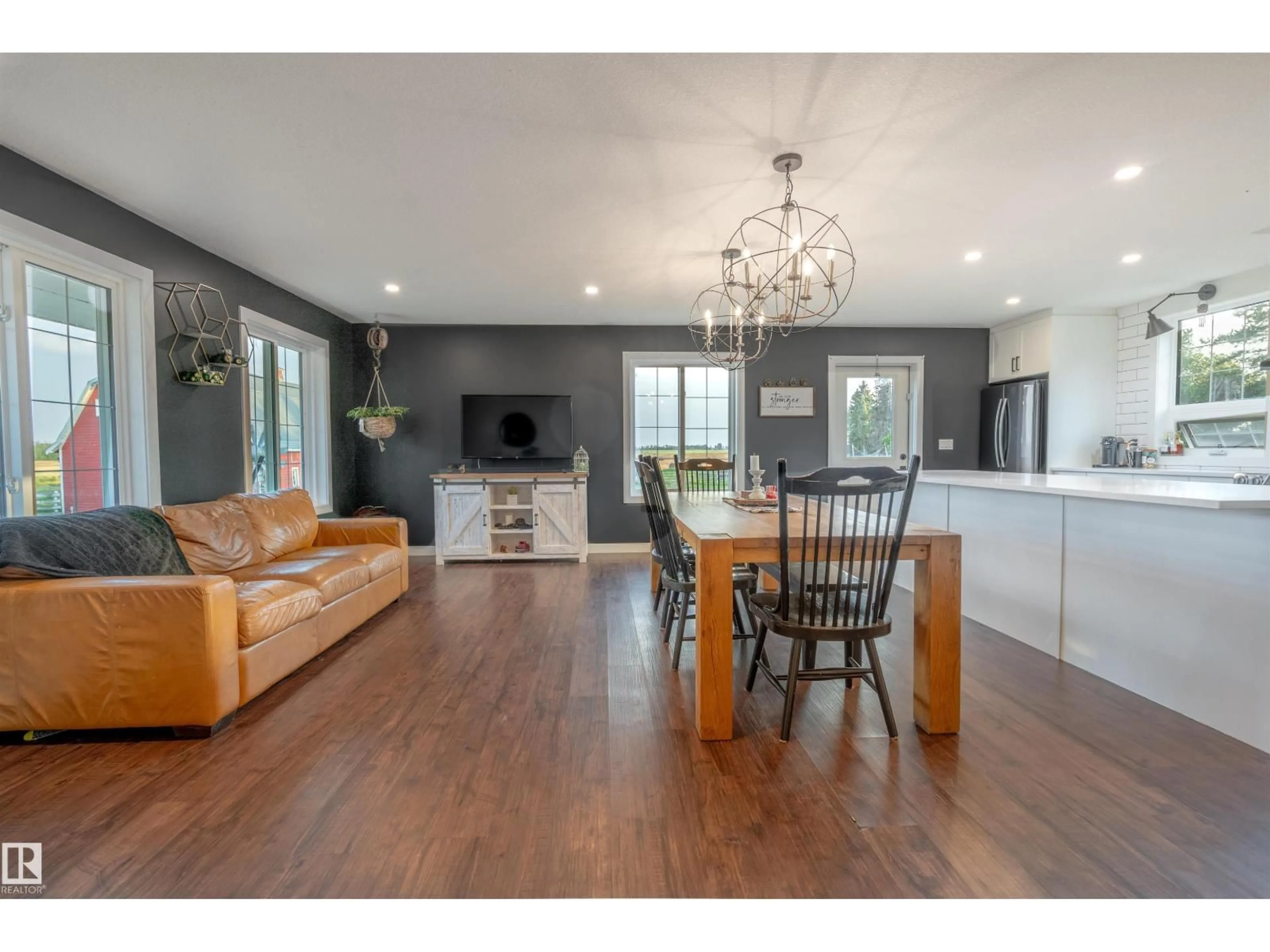 Open concept kitchen, wood/laminate floor for 261015 HWY 616, Rural Wetaskiwin County Alberta T0C1Z0
