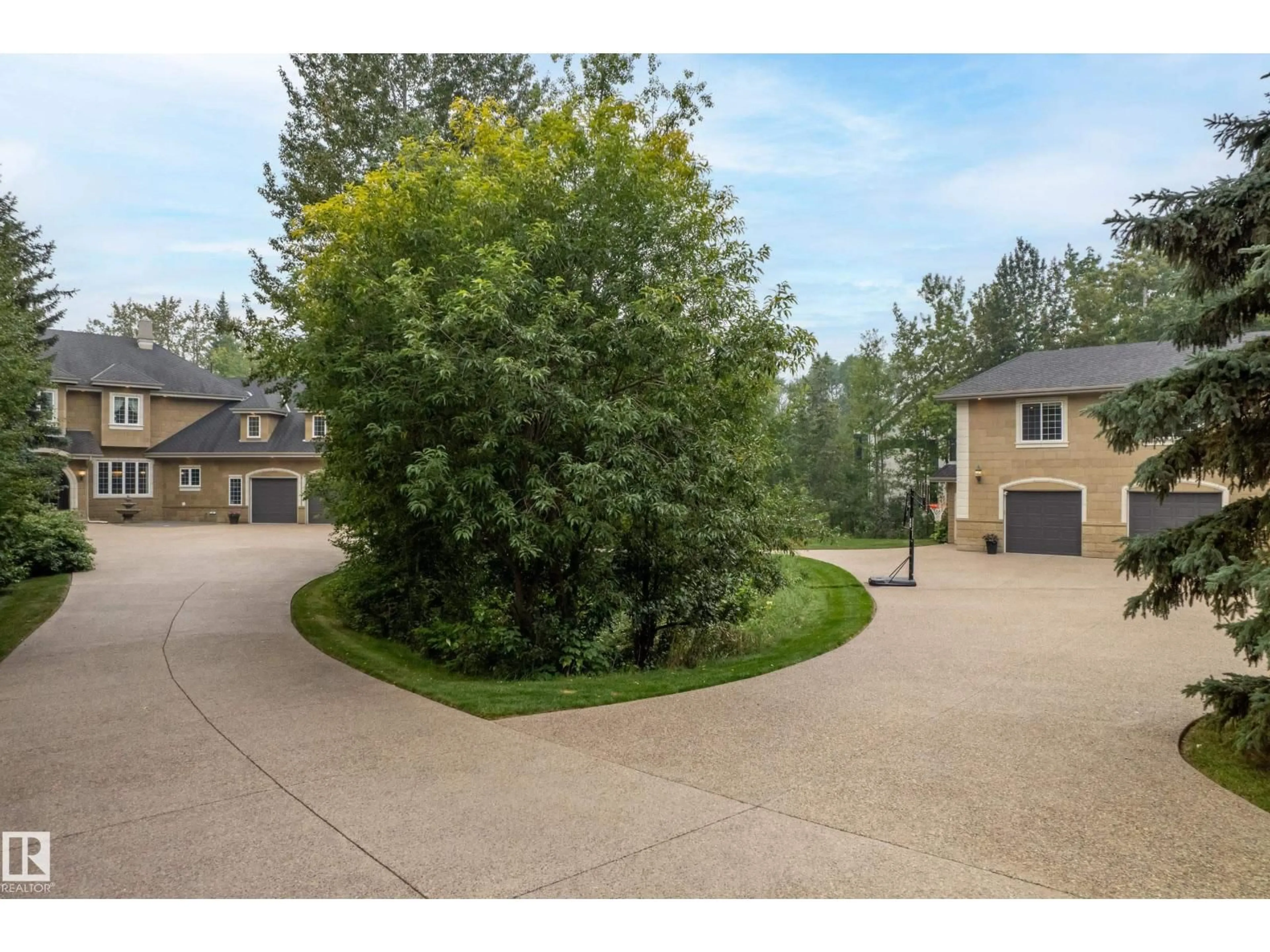 A pic from outside/outdoor area/front of a property/back of a property/a pic from drone, street for 52147 - 120 RGE ROAD 231, Rural Strathcona County Alberta T8B1A4