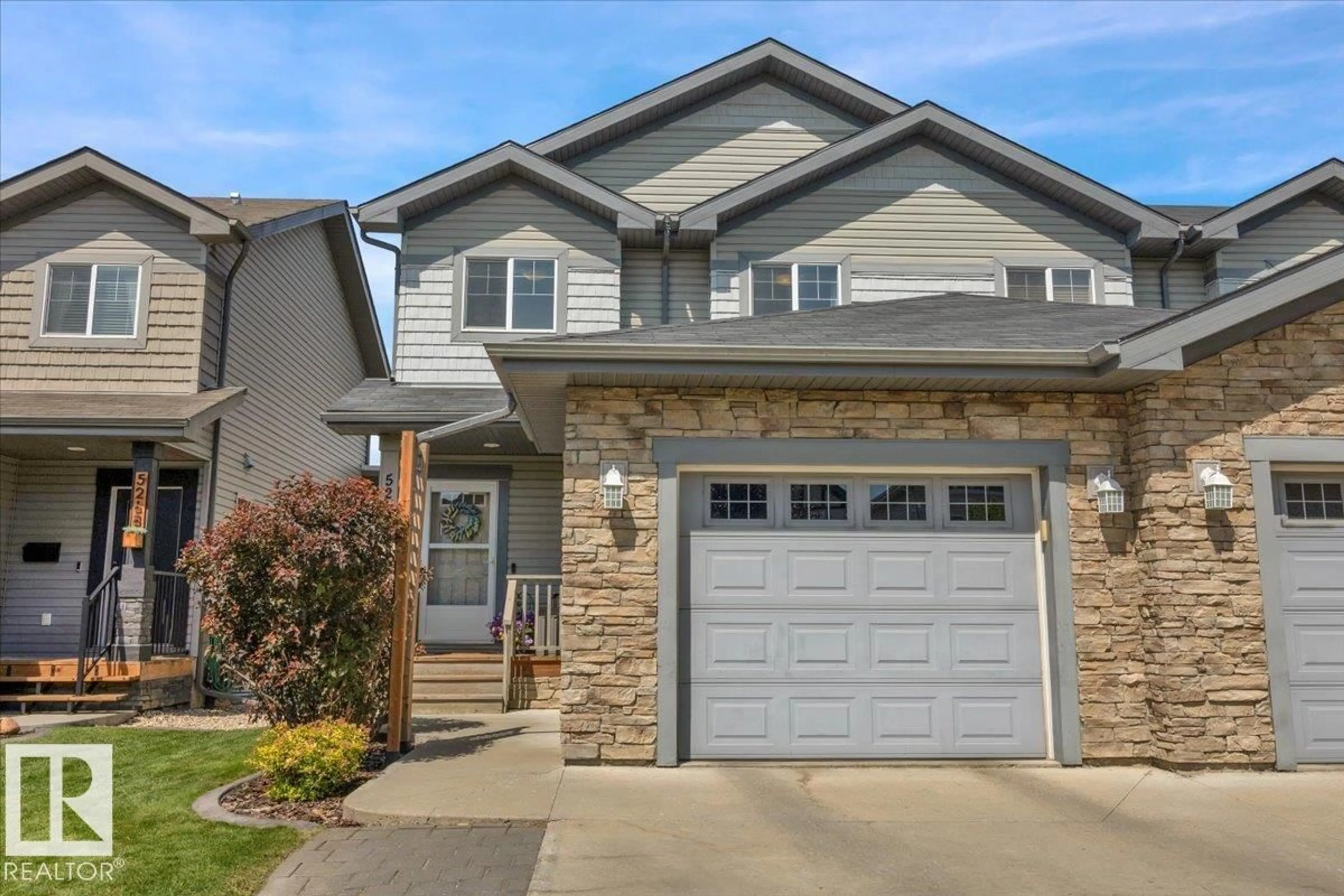Home with vinyl exterior material, street for SW - 5264 1A AV, Edmonton Alberta T6X0X1