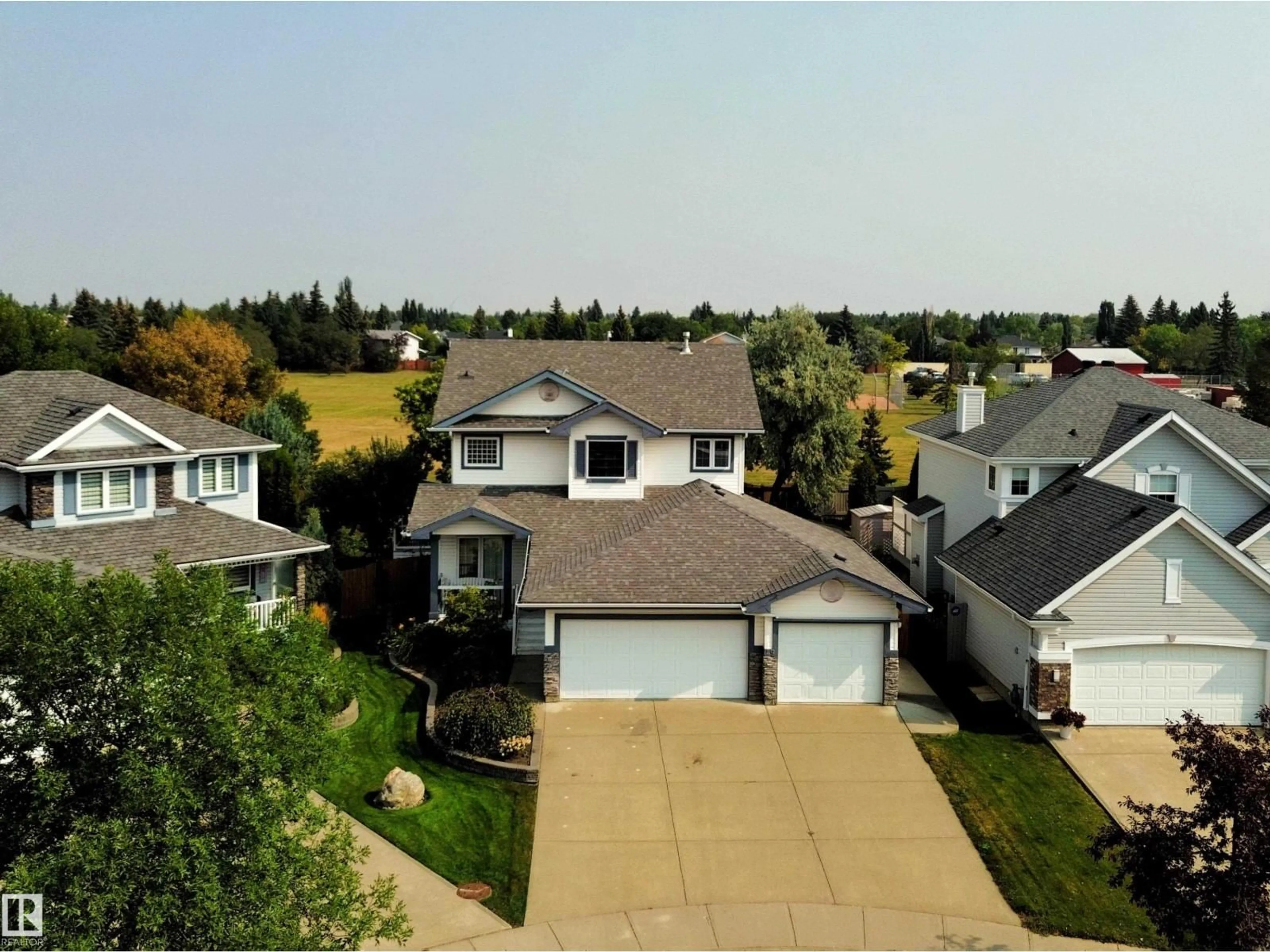 A pic from outside/outdoor area/front of a property/back of a property/a pic from drone, street for 49 DUNFIELD CR, St. Albert Alberta T8N6R8