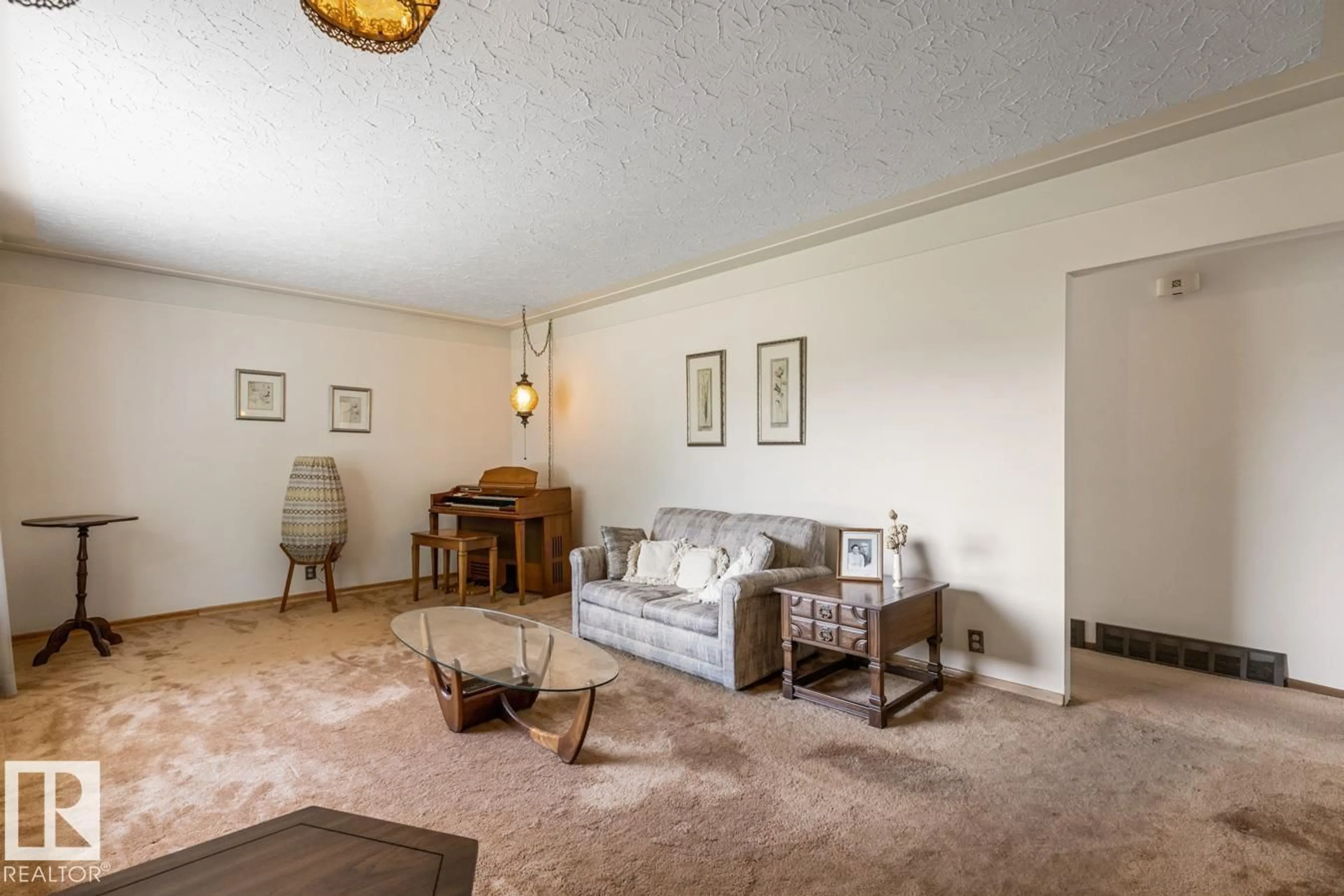 Living room with furniture, unknown for 9936 81 ST NW, Edmonton Alberta T6A3K3