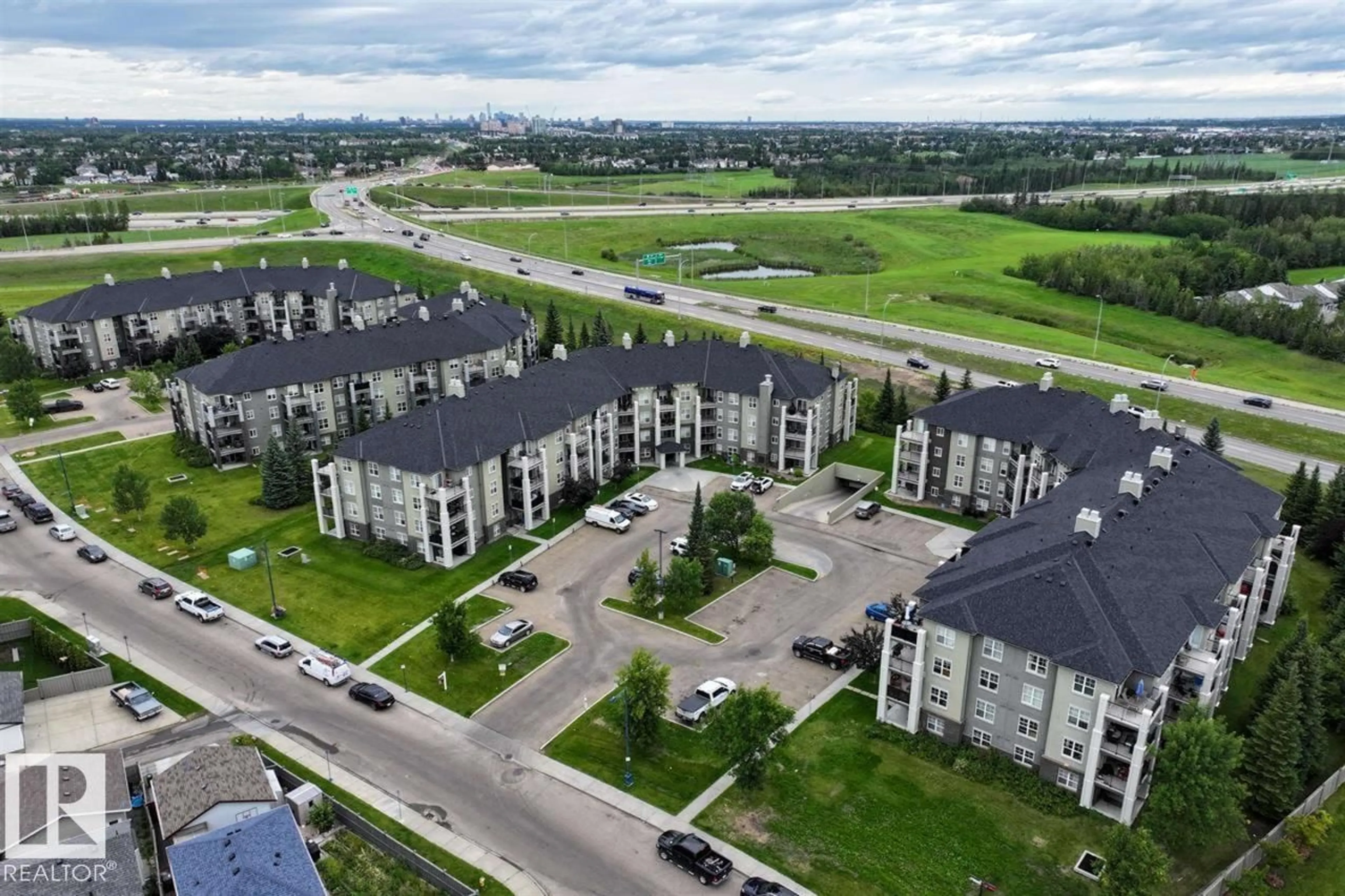 A pic from outside/outdoor area/front of a property/back of a property/a pic from drone, city buildings view from balcony for #307 - 622 MCALLISTER LO, Edmonton Alberta T6W1N2