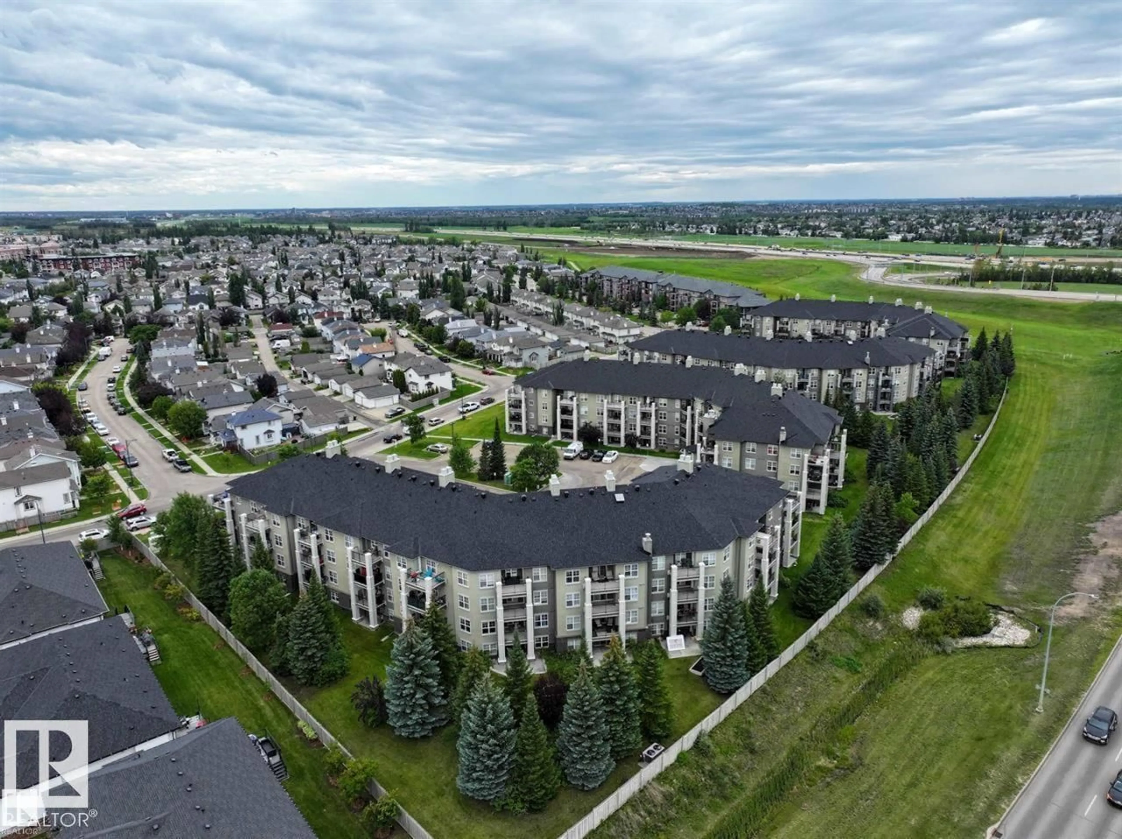 A pic from outside/outdoor area/front of a property/back of a property/a pic from drone, unknown for #307 - 622 MCALLISTER LO, Edmonton Alberta T6W1N2