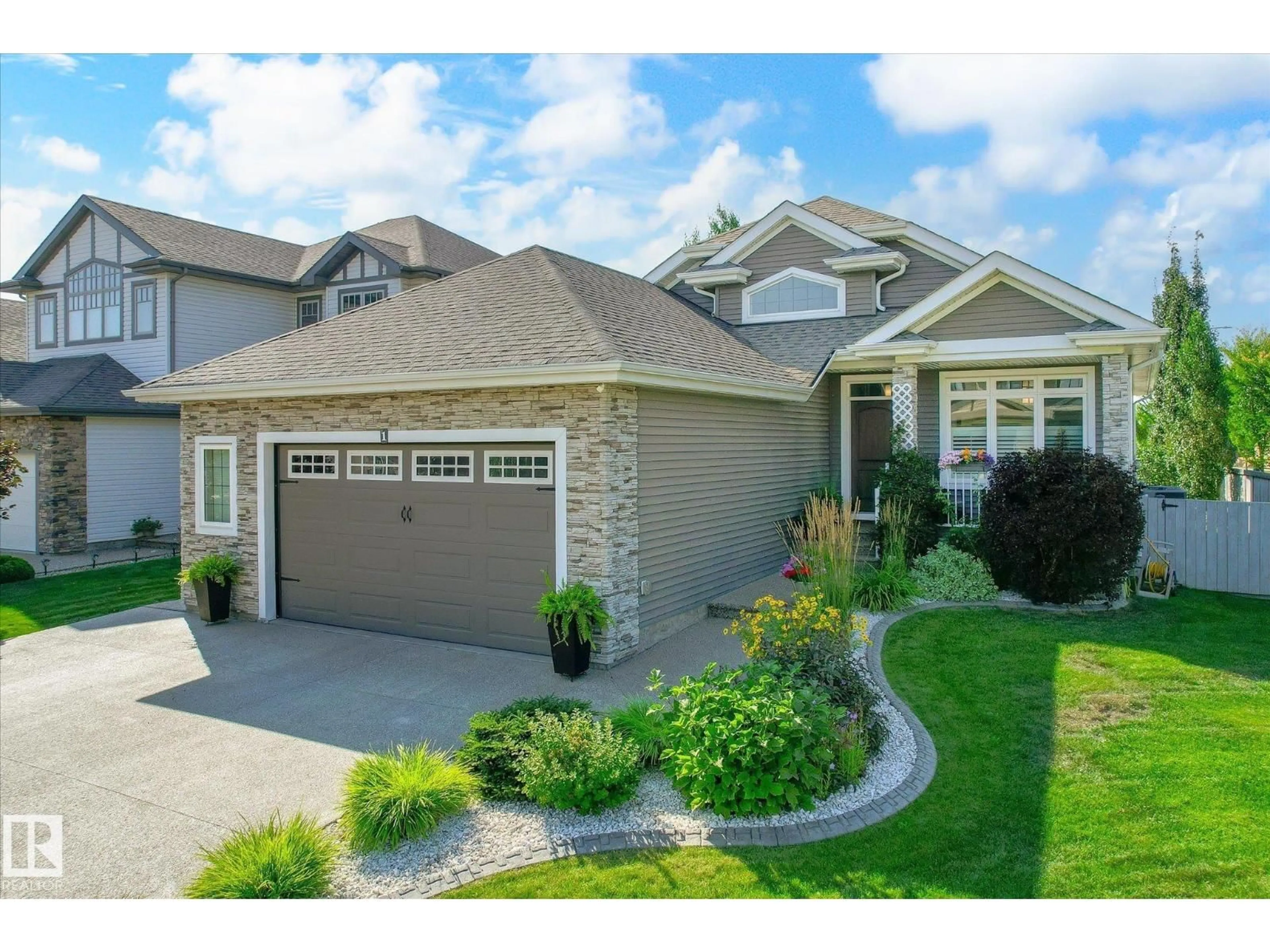 Home with vinyl exterior material, street for 1 LINCOLN, Spruce Grove Alberta T7X0N5