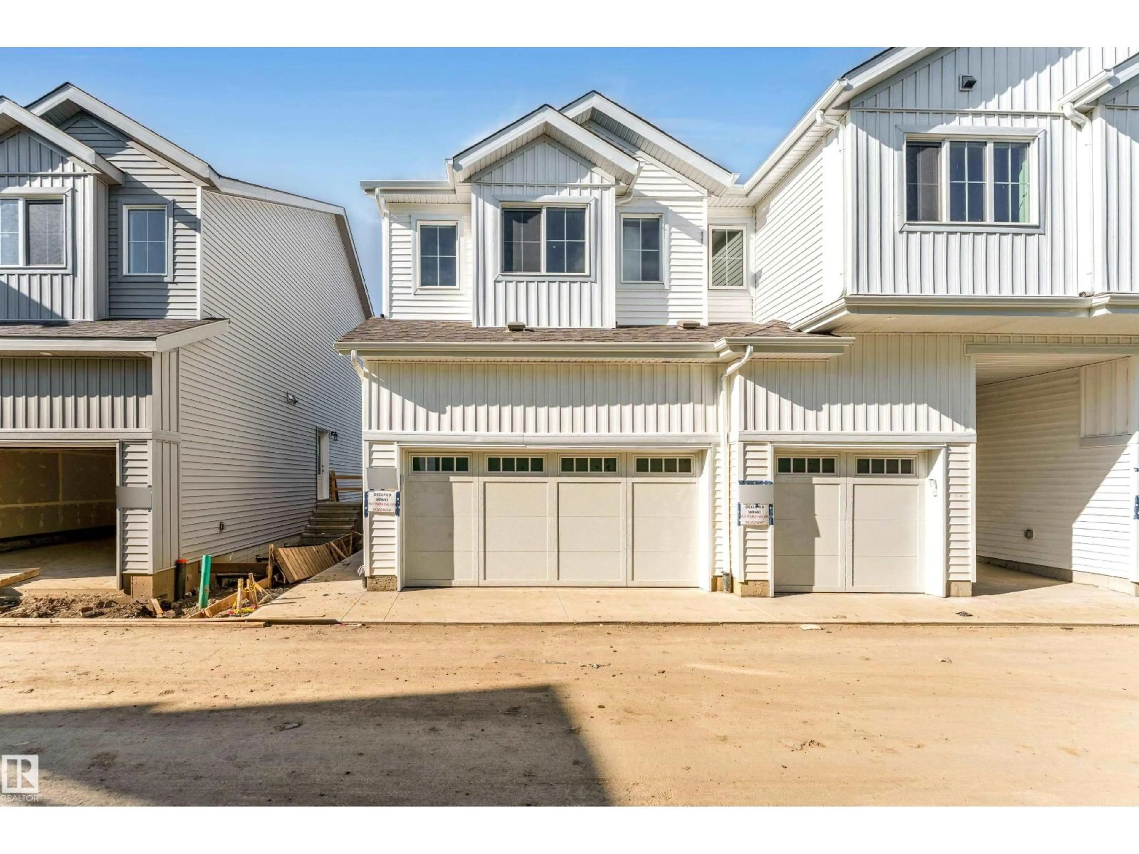 Home with vinyl exterior material, street for 4 - 7110 KESWICK CM, Edmonton Alberta T6W5P7