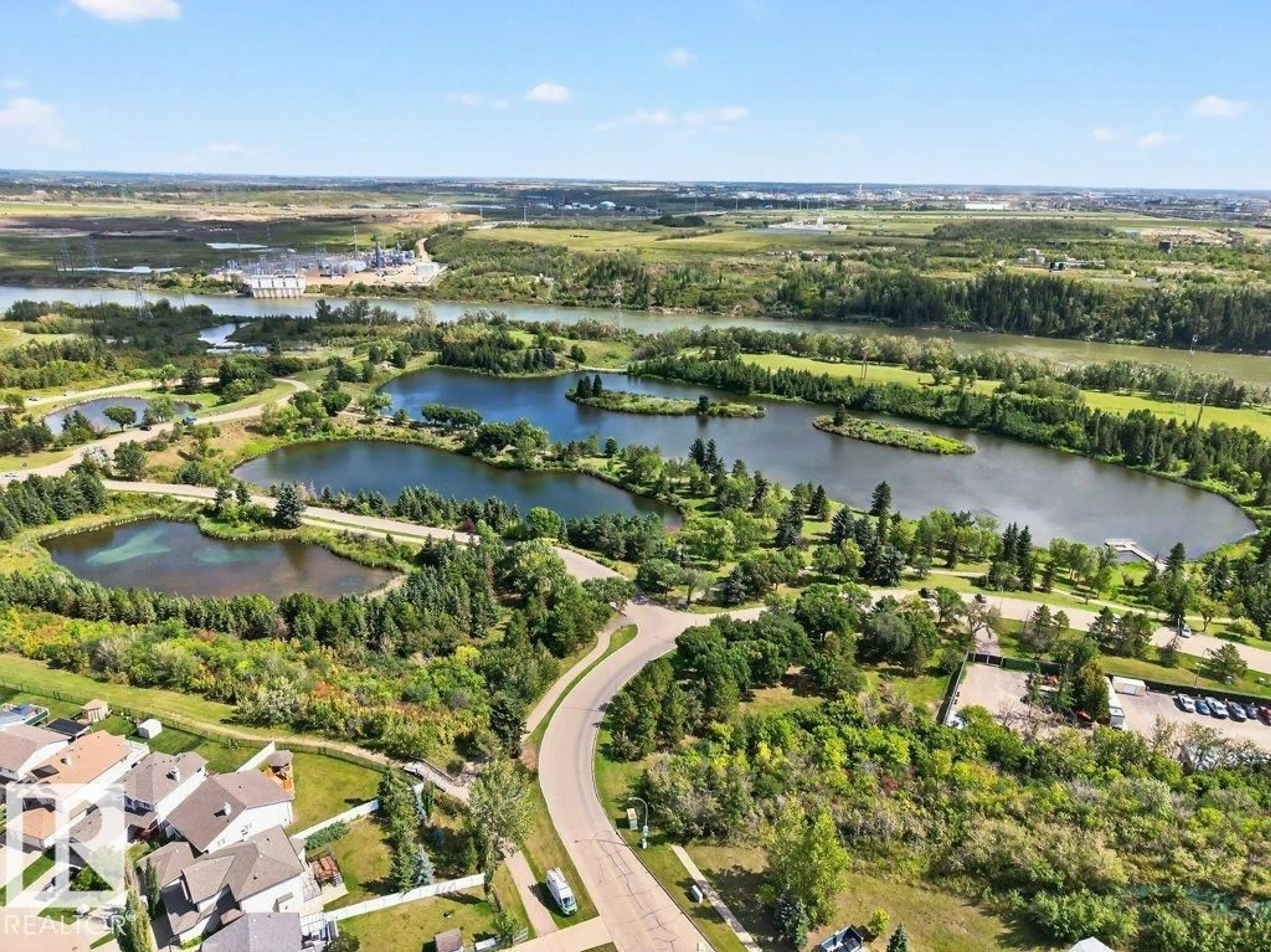 A pic from outside/outdoor area/front of a property/back of a property/a pic from drone, water/lake/river/ocean view for 21 - 450 HYNDMAN CR, Edmonton Alberta T5A0E2