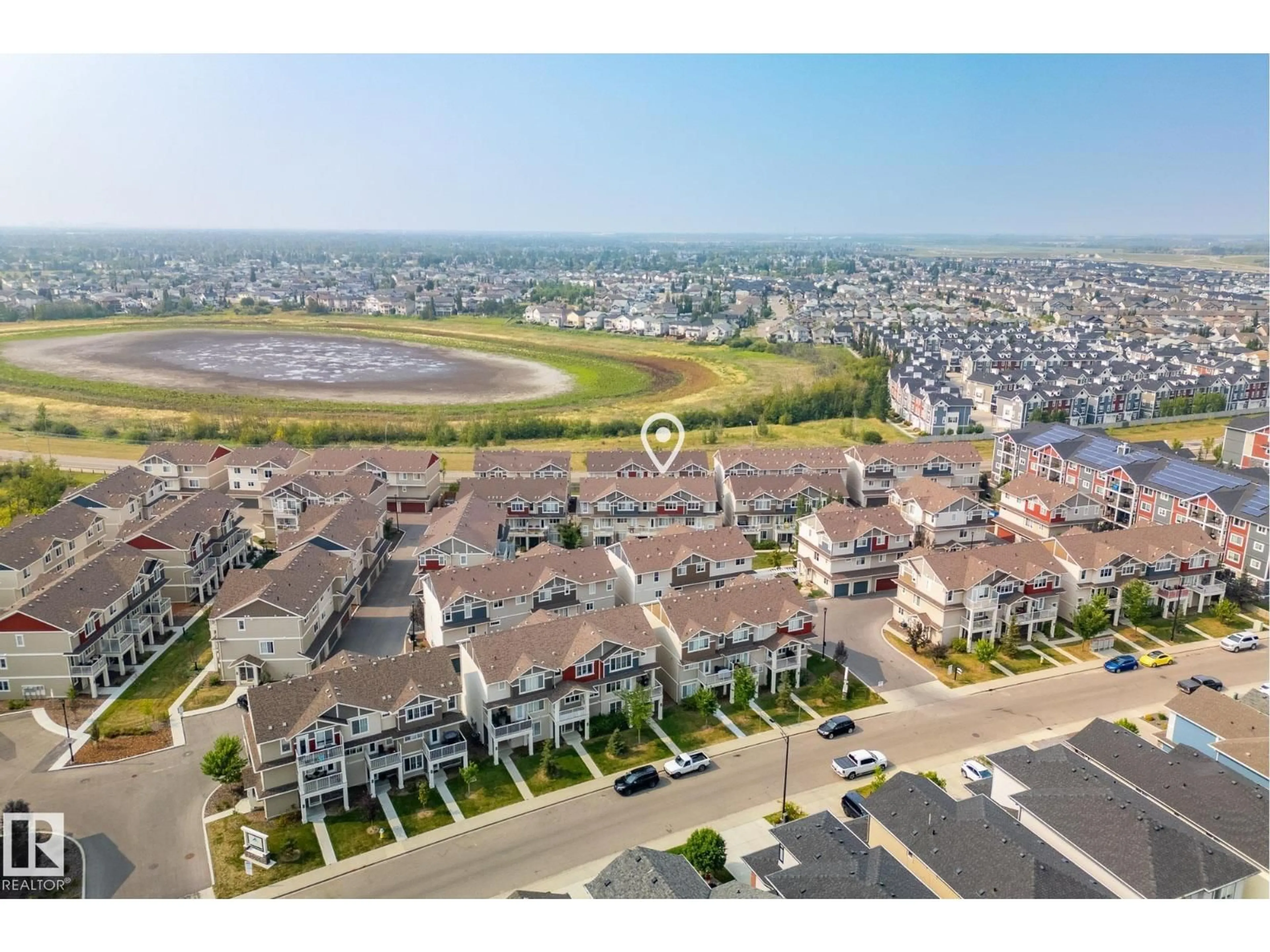 A pic from outside/outdoor area/front of a property/back of a property/a pic from drone, unknown for 94 17832 78 ST NW, Edmonton Alberta T5Z0P7