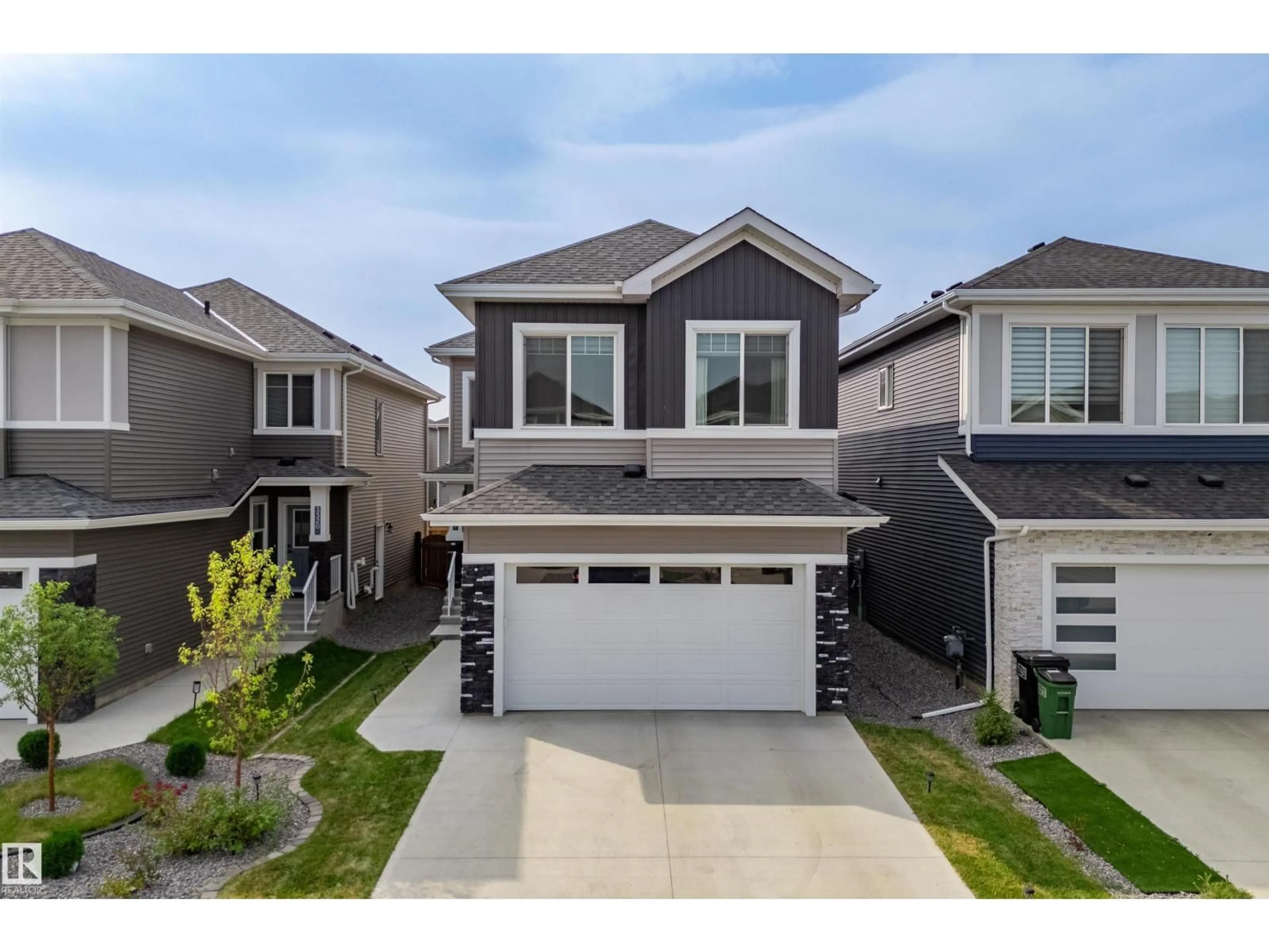 Home with vinyl exterior material, street for SW - 3316 158 ST, Edmonton Alberta T6W5A1