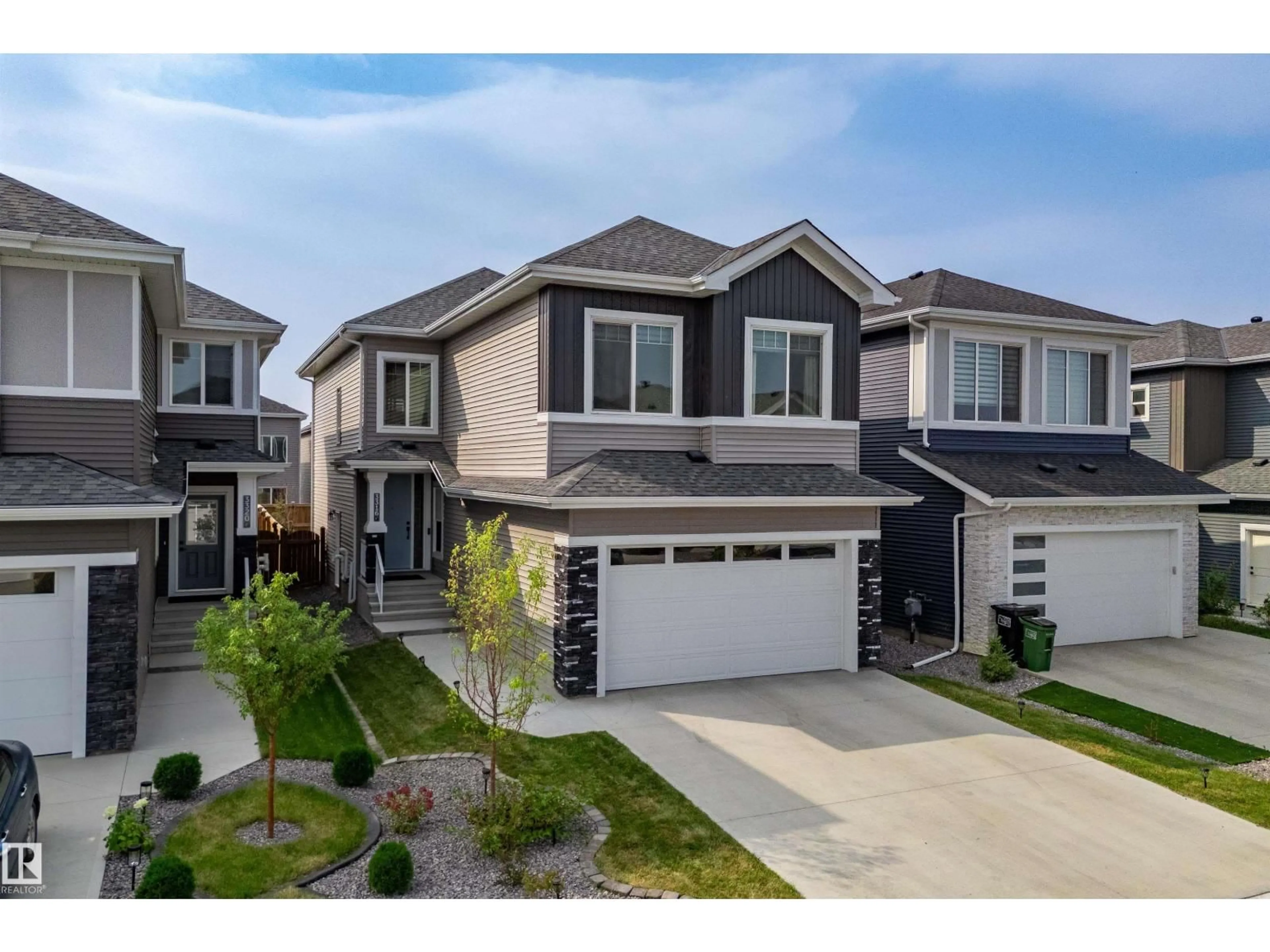 Home with vinyl exterior material, street for SW - 3316 158 ST, Edmonton Alberta T6W5A1